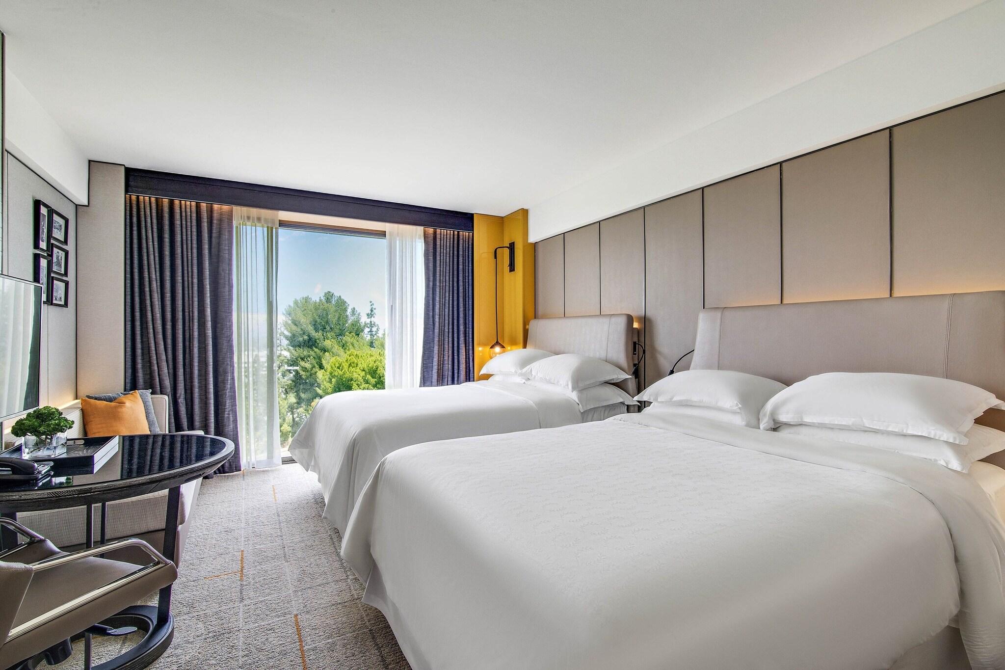 Quadruple Two Queen Beds