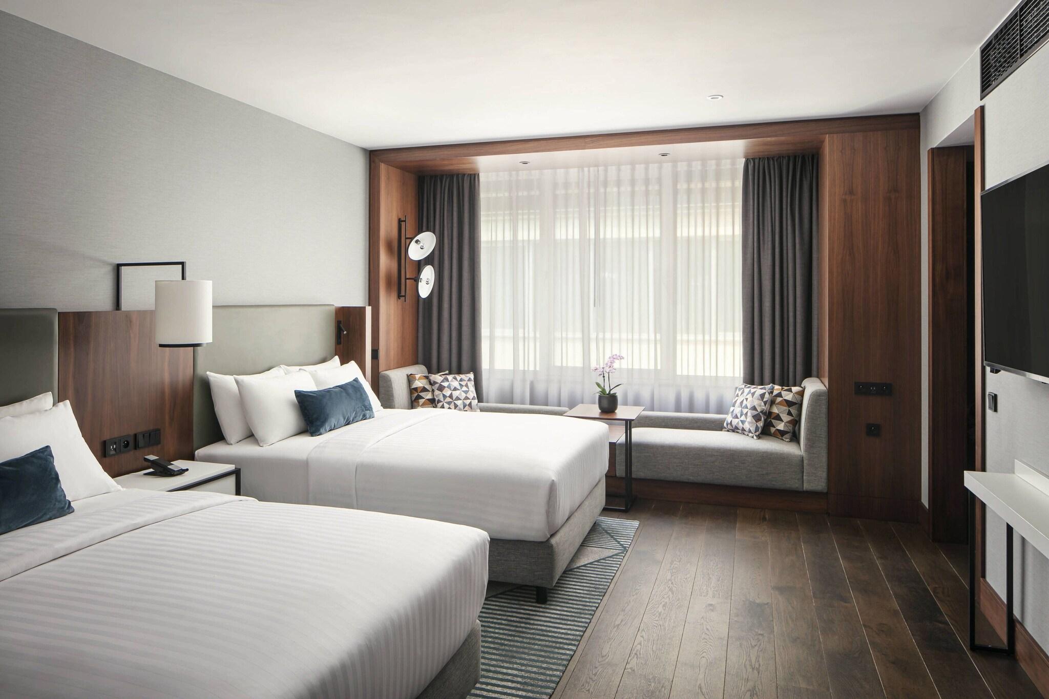 Quadruple Club Two Queen Beds