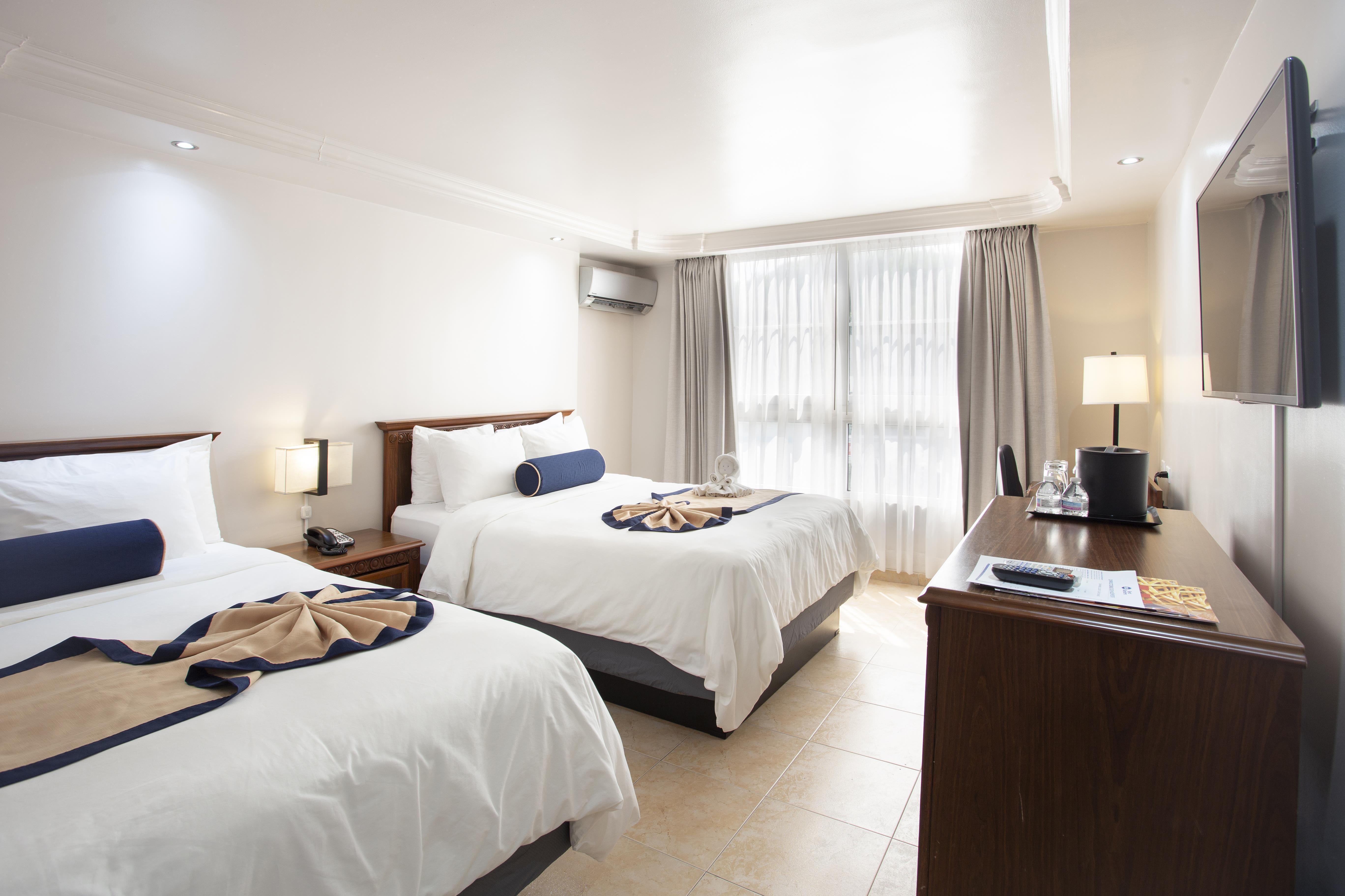 Triple Two Queen Beds
