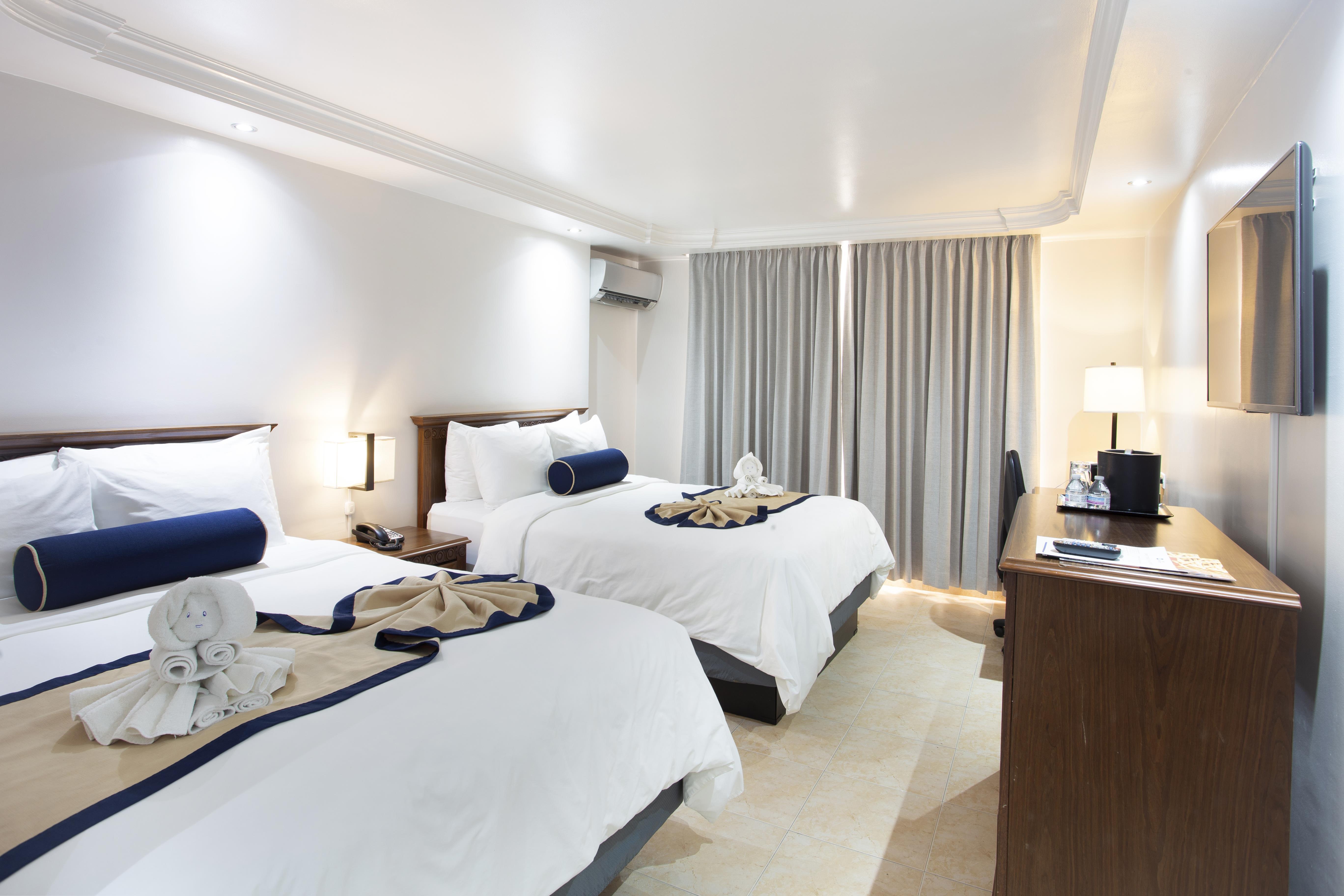 Triple Two Queen Beds