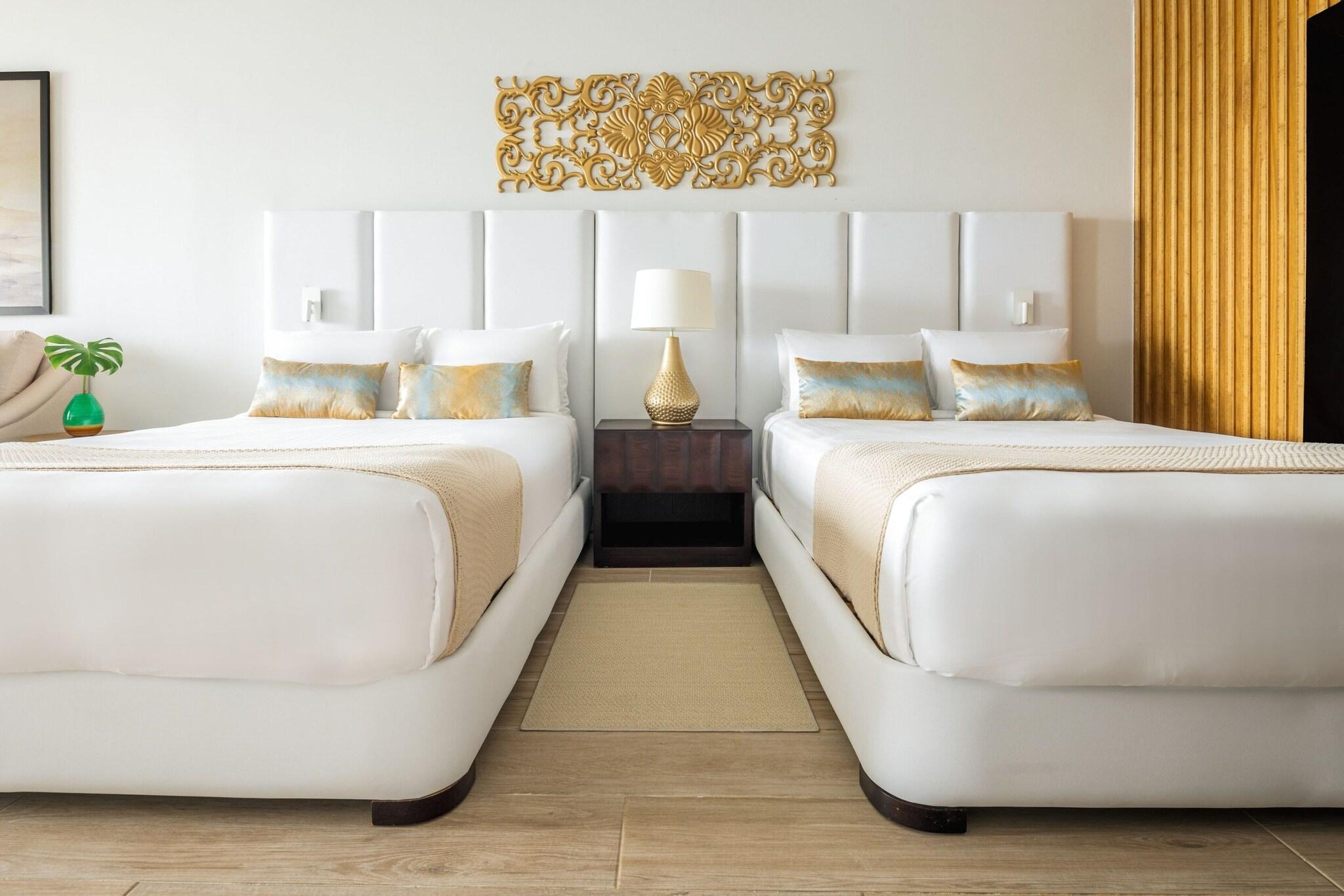 Quadruple Garden View Two Queen Beds