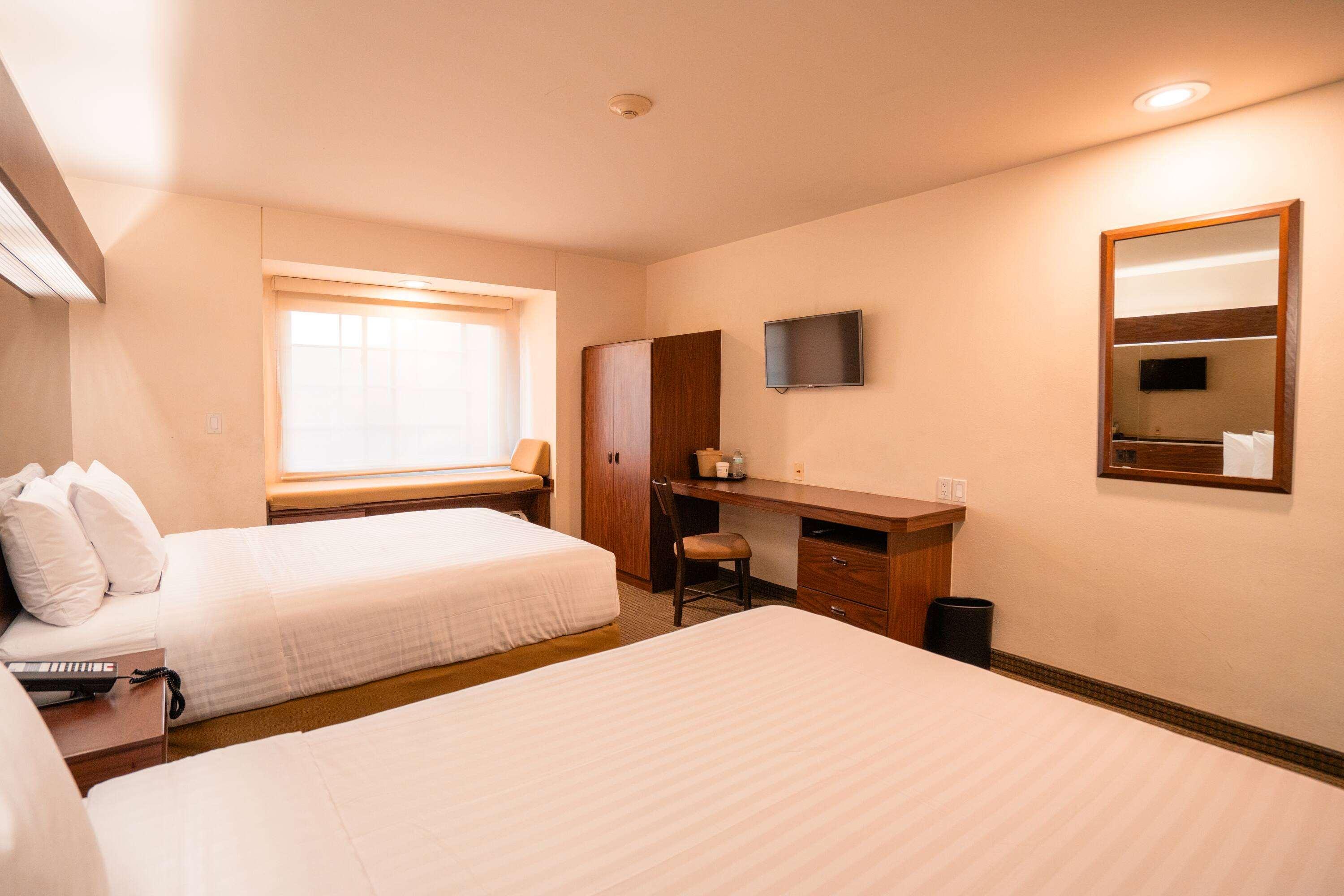 Quadruple Two Queen Beds