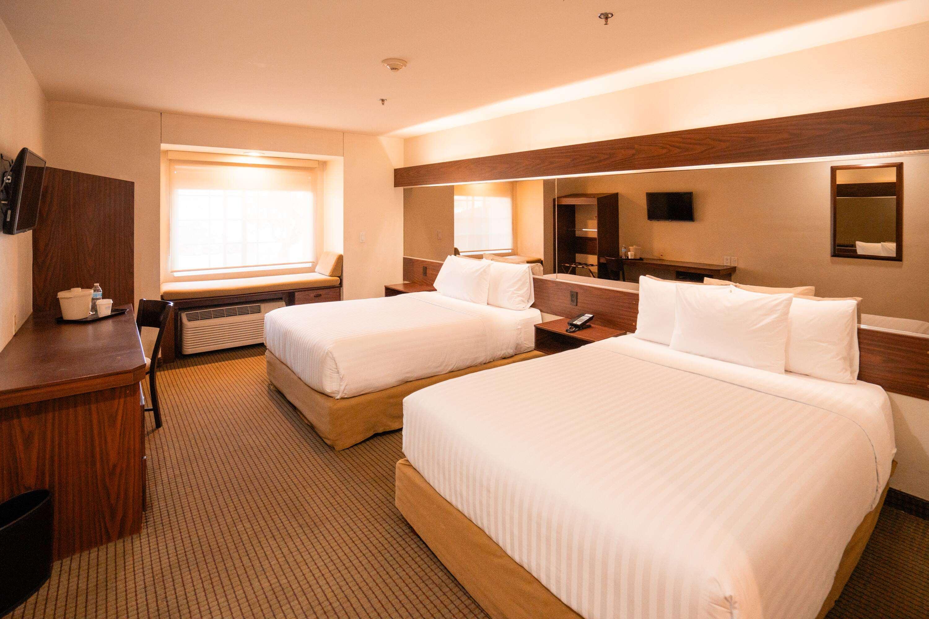 Quadruple Two Queen Beds