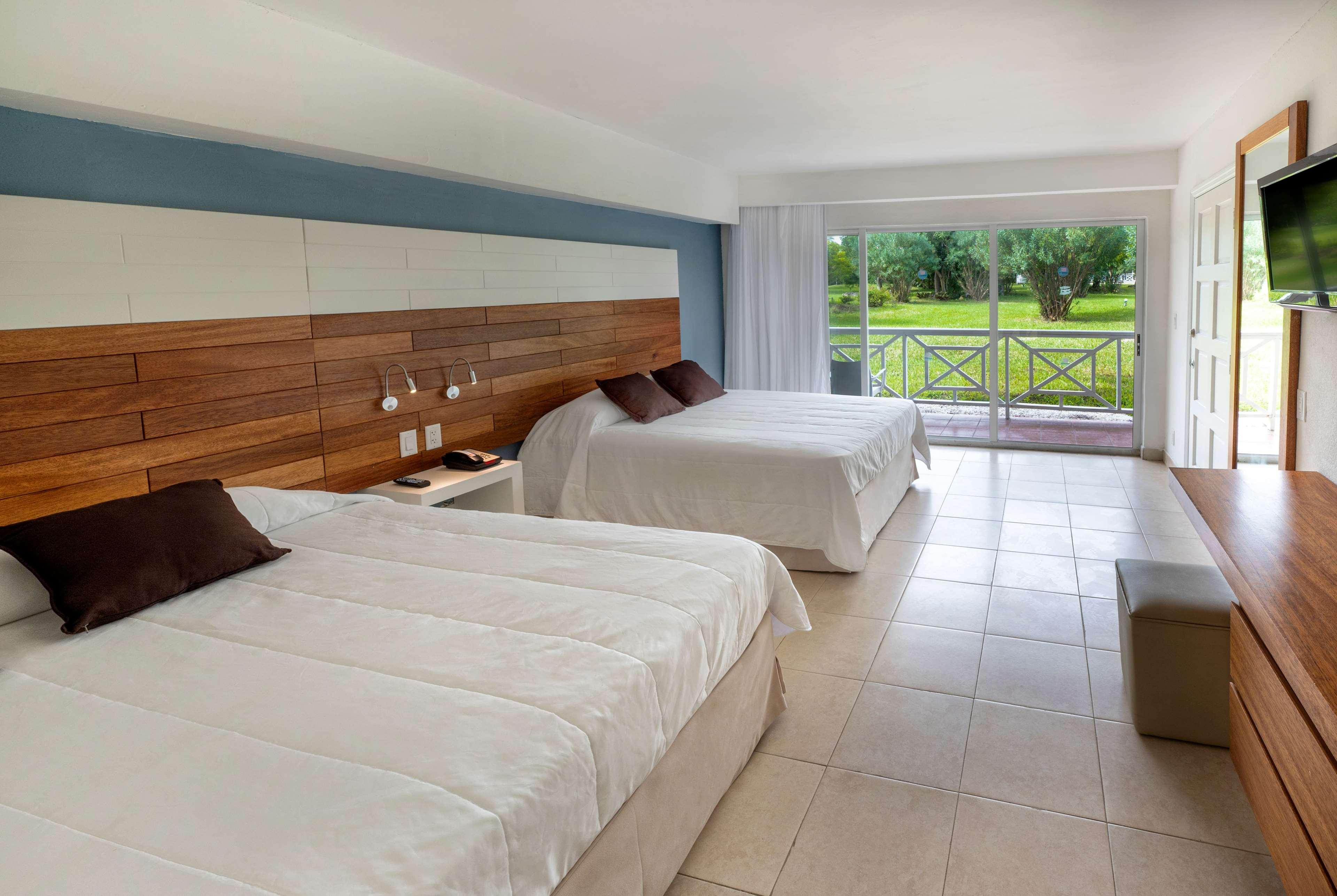 Quadruple Two Queen Beds