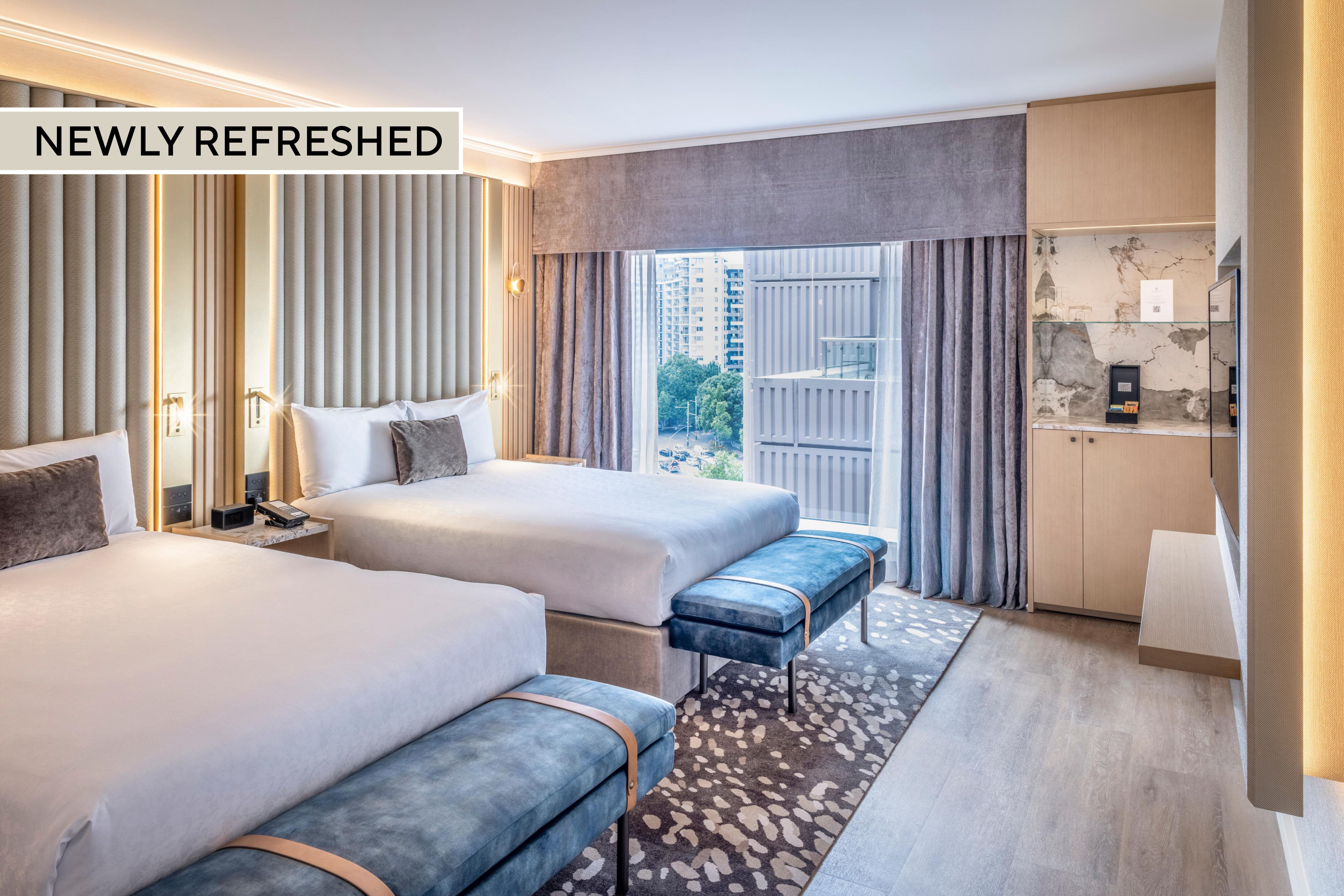 Twin Club Two Queen Beds