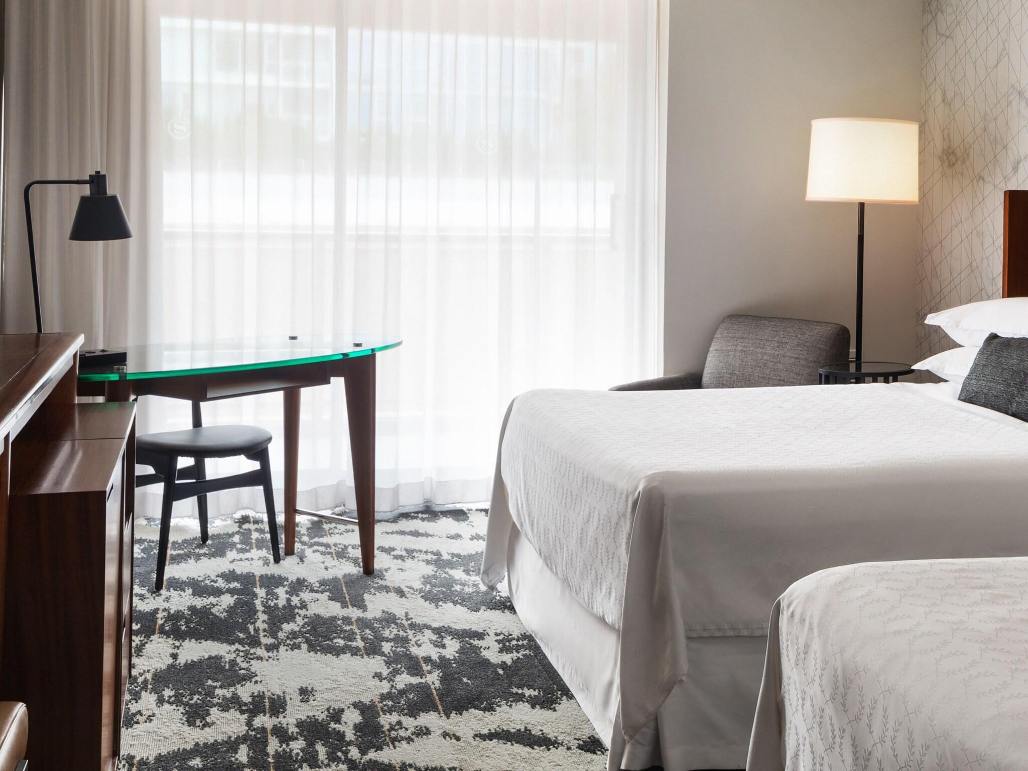 Quadruple City View Two Queen Beds