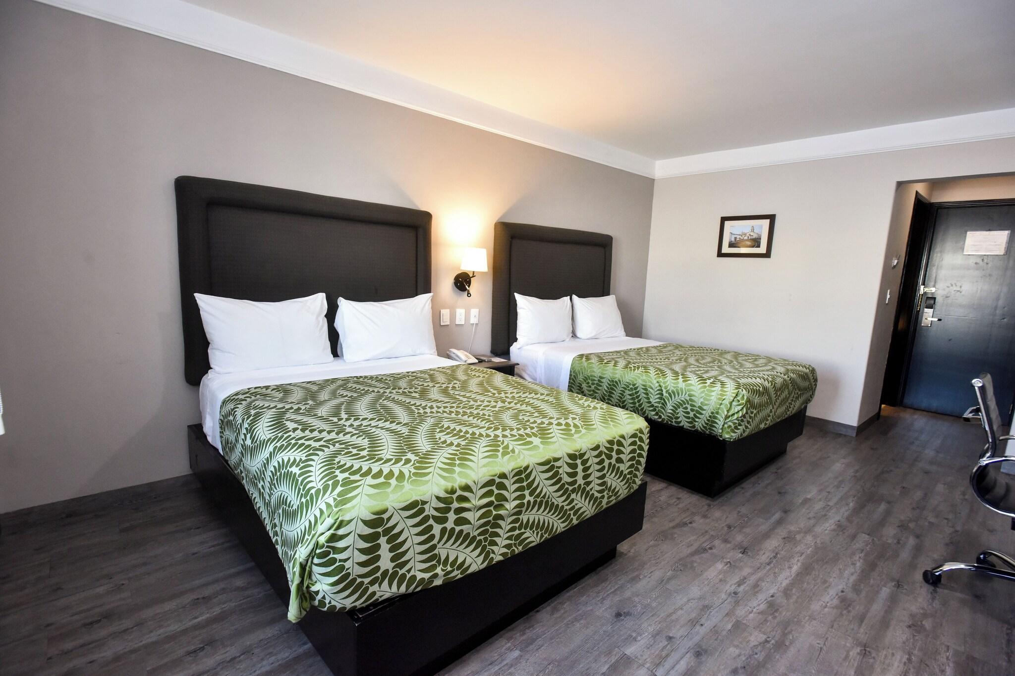 Double Deluxe Two Double Beds