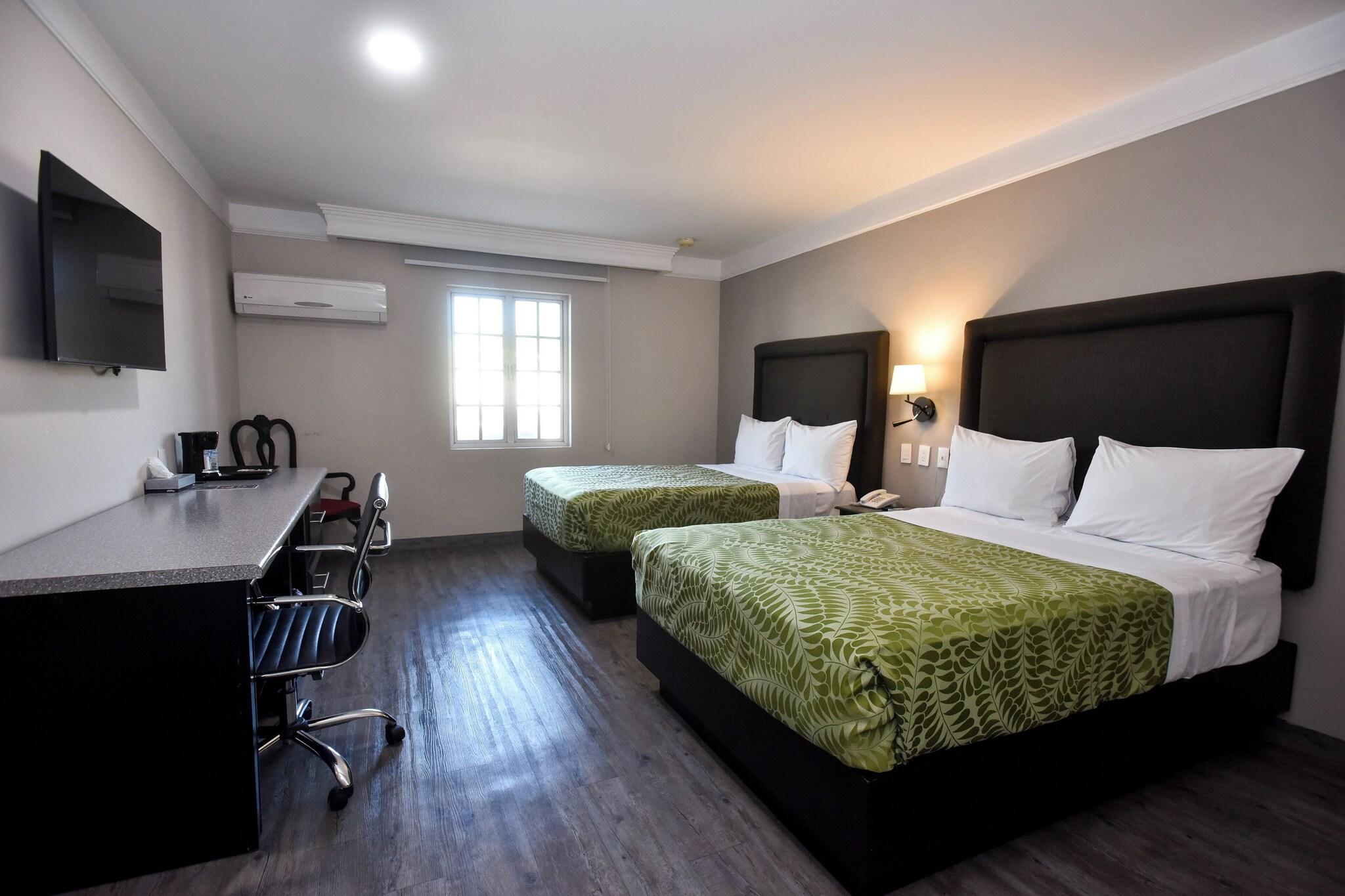 Double Deluxe Two Double Beds