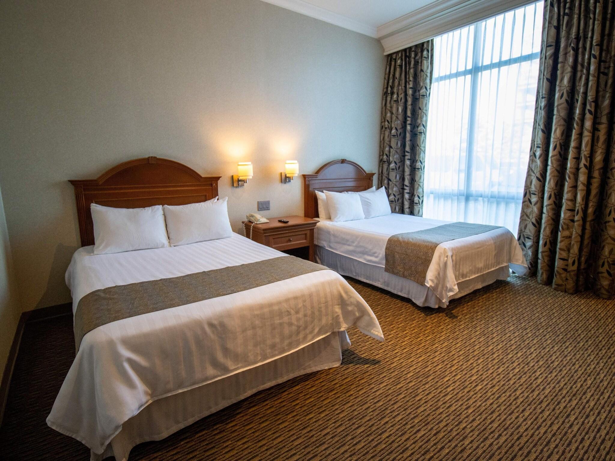 Double Deluxe Two Double Beds