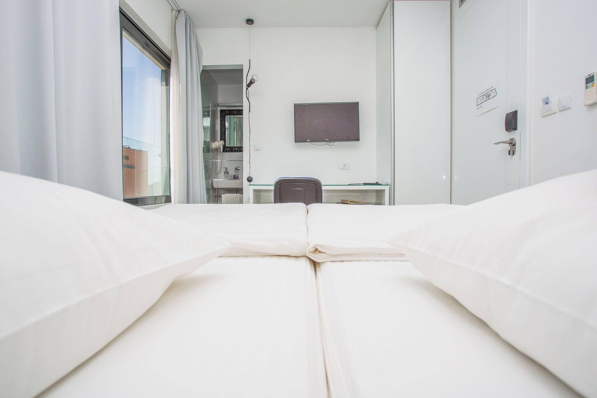 Quadruple Classic with Balcony