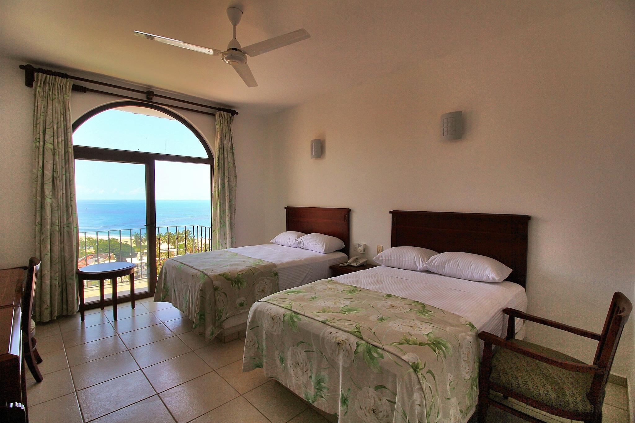 Twin Ocean View Two Double Beds
