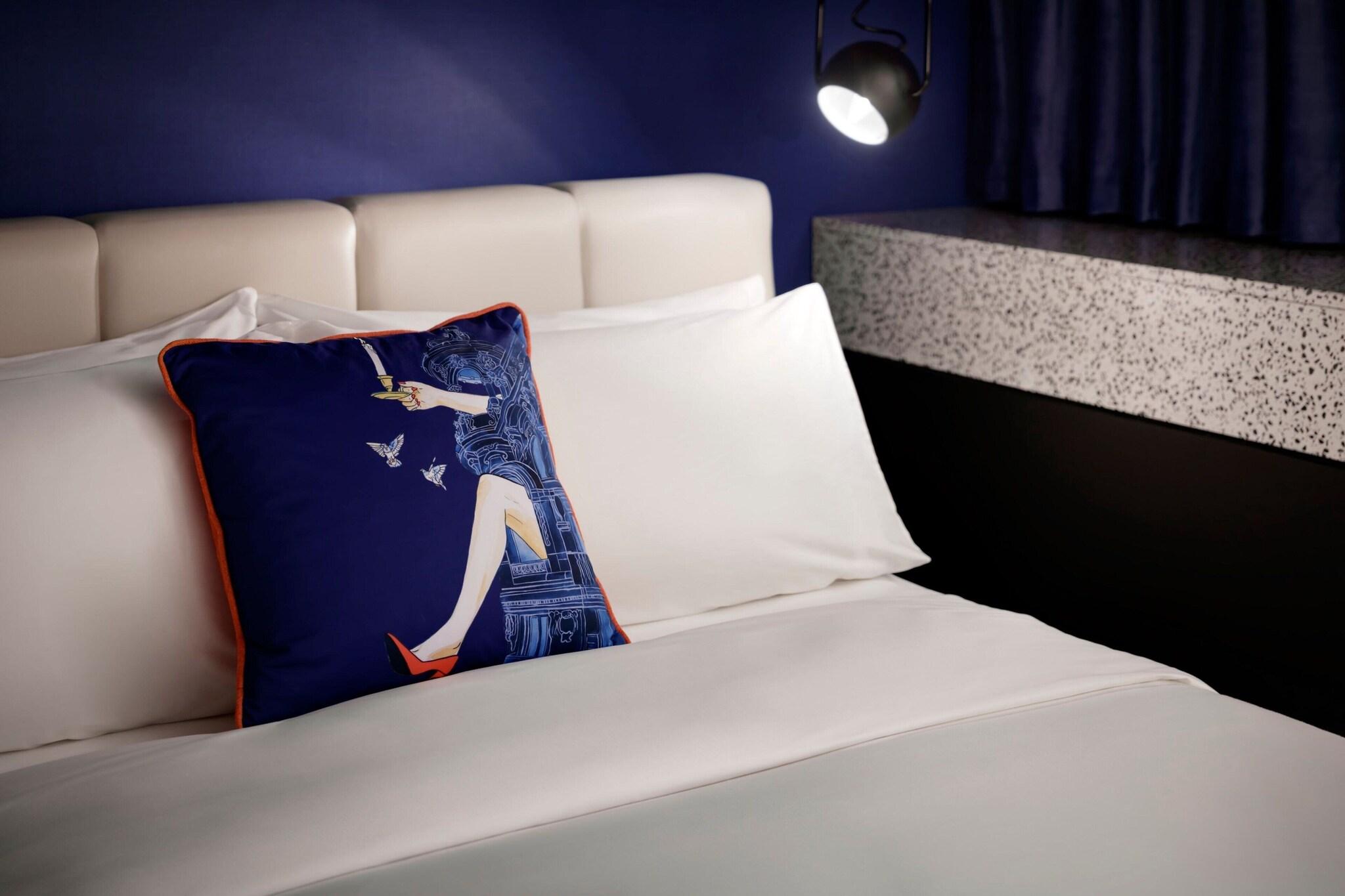 Quadruple Deluxe Two Queen Beds