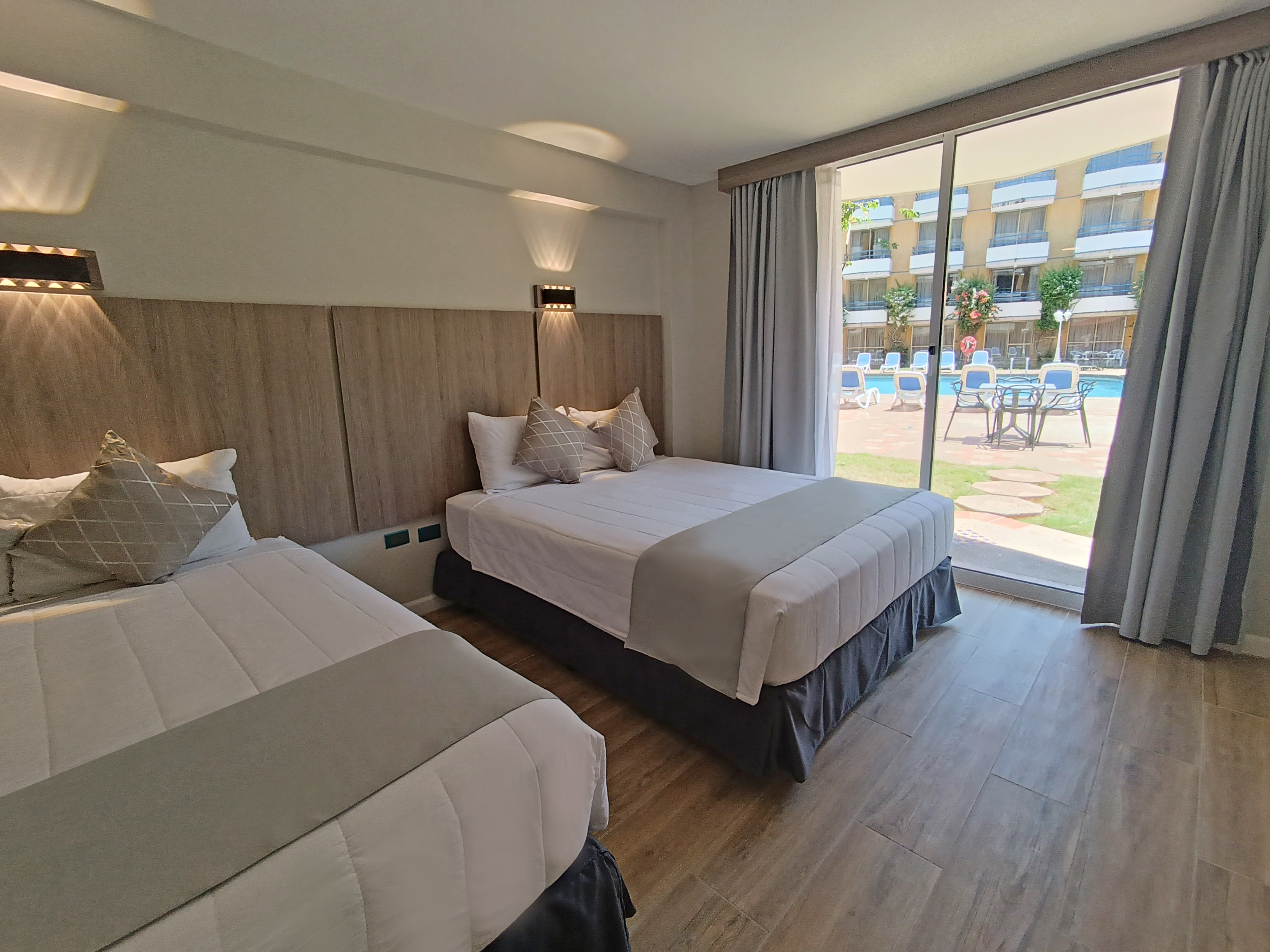 Twin Deluxe Queen Bed