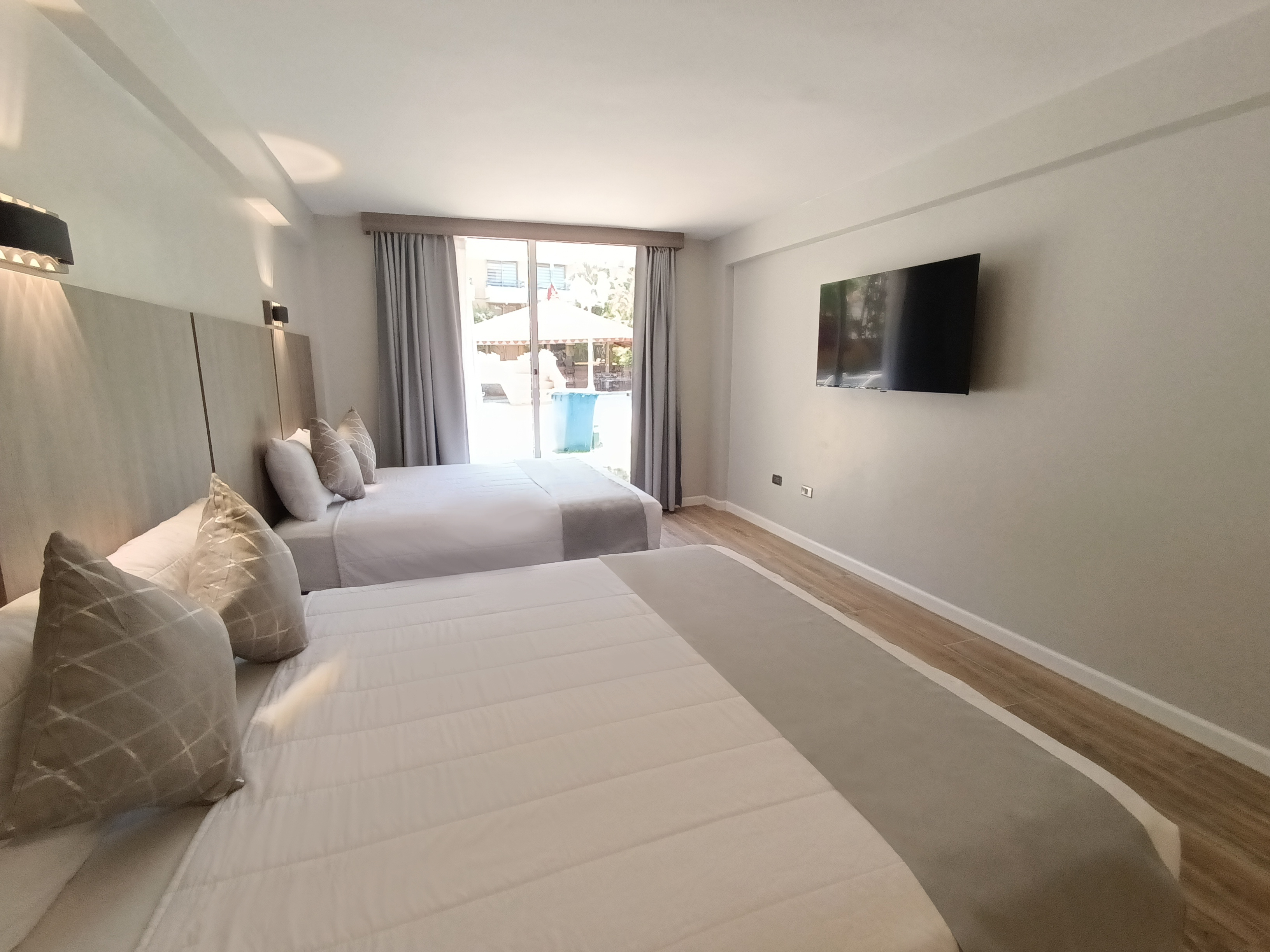 Twin Deluxe Queen Bed