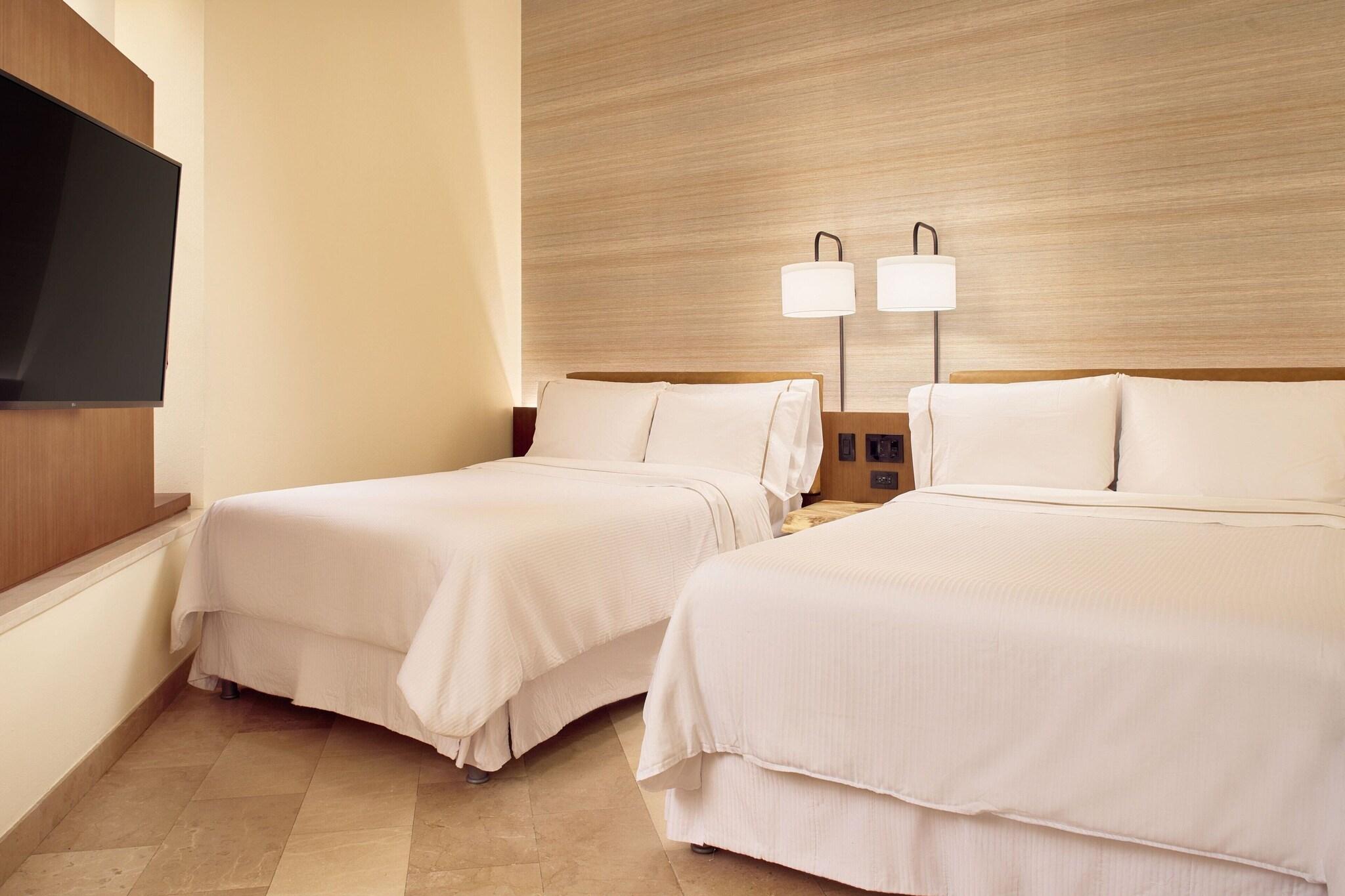 Junior Suite Deluxe Two Double Beds