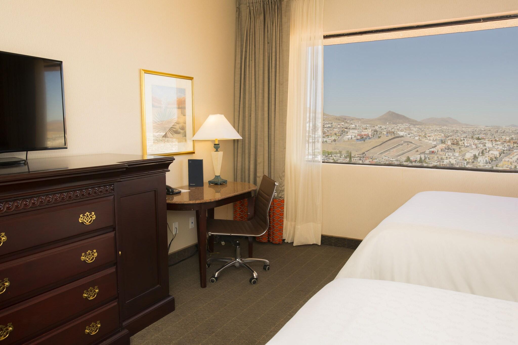 Quadruple City View Two Queen Beds