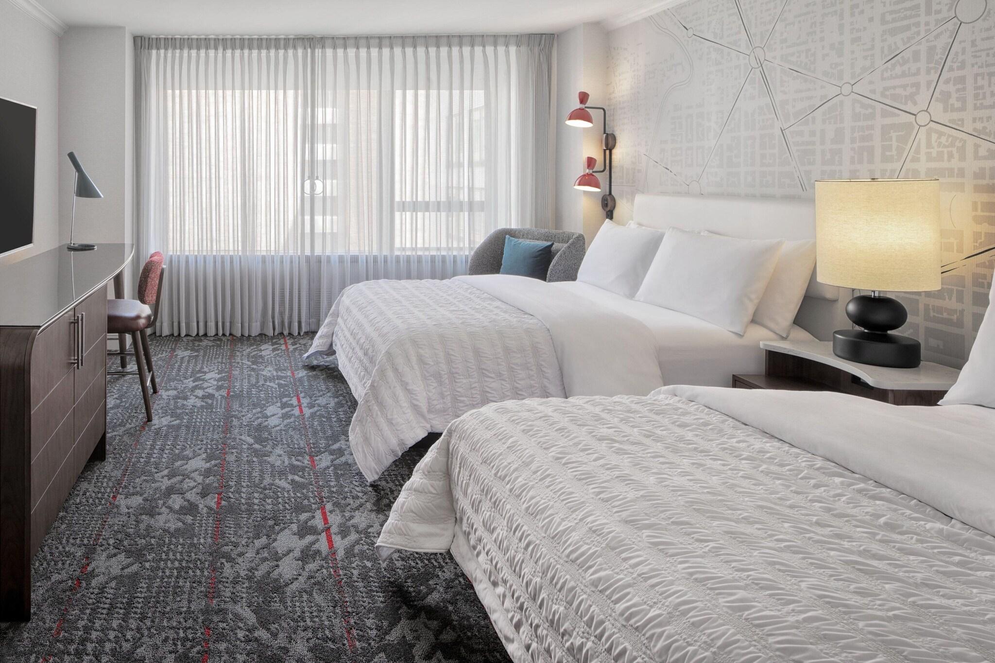 Quadruple Classic Two Queen Beds