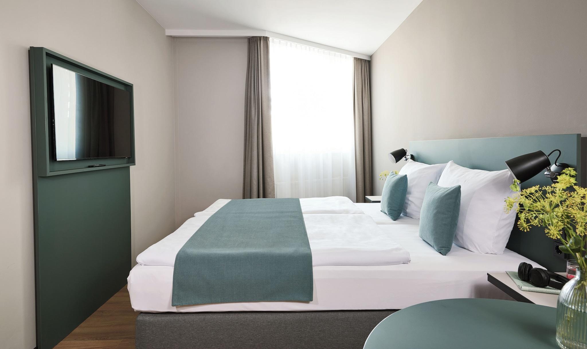 Twin Deluxe Queen Bed