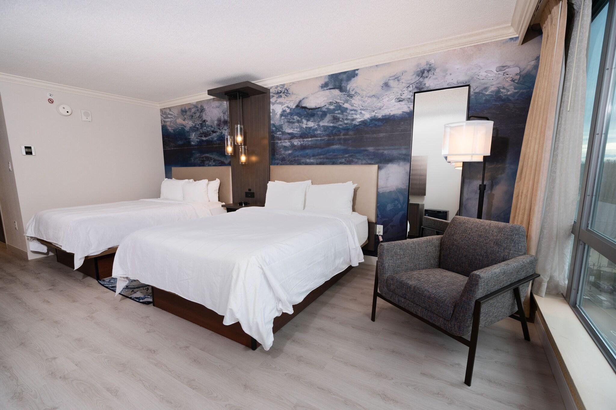 Quadruple Deluxe Two Queen Beds