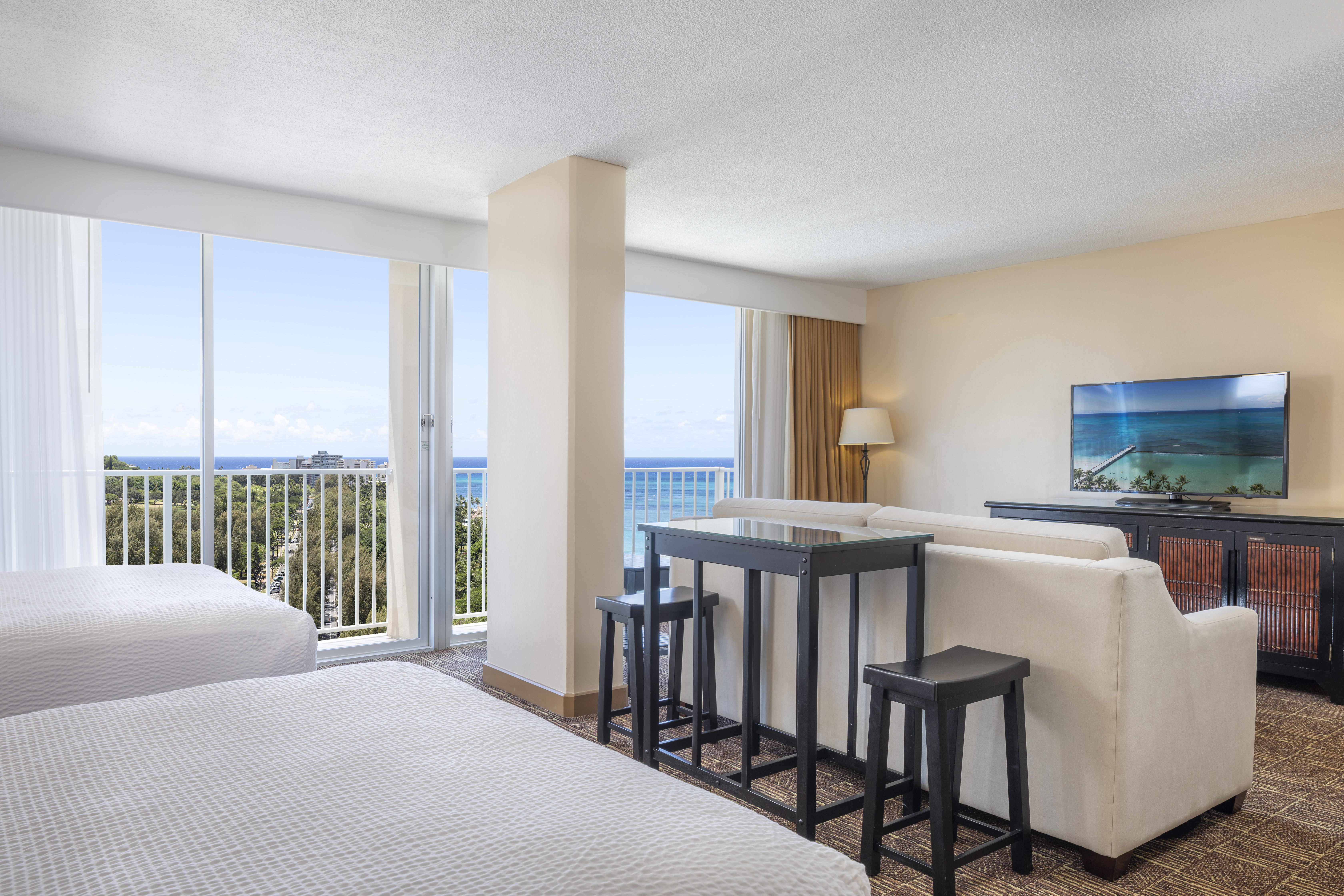 Junior Suite Partial Ocean View Two Double Beds