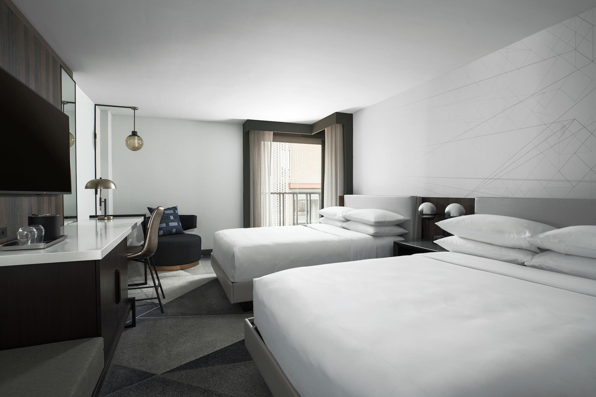 Quadruple Club Two Queen Beds