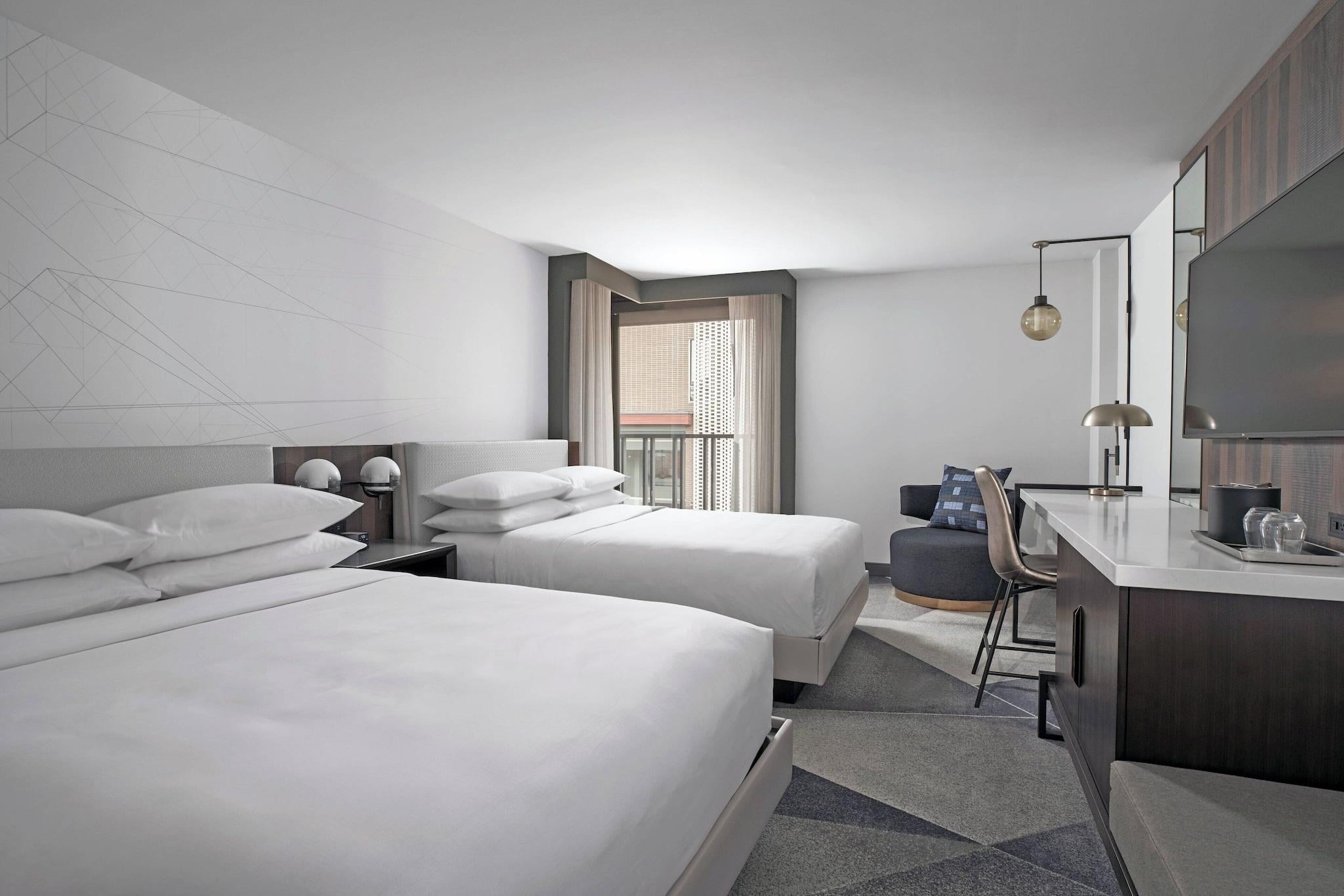 Quadruple Club Two Queen Beds