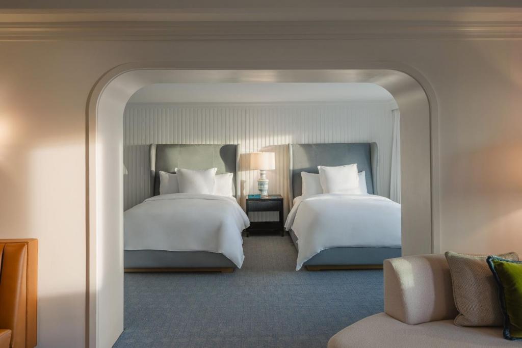 Quadruple Two Queen Beds Pool View