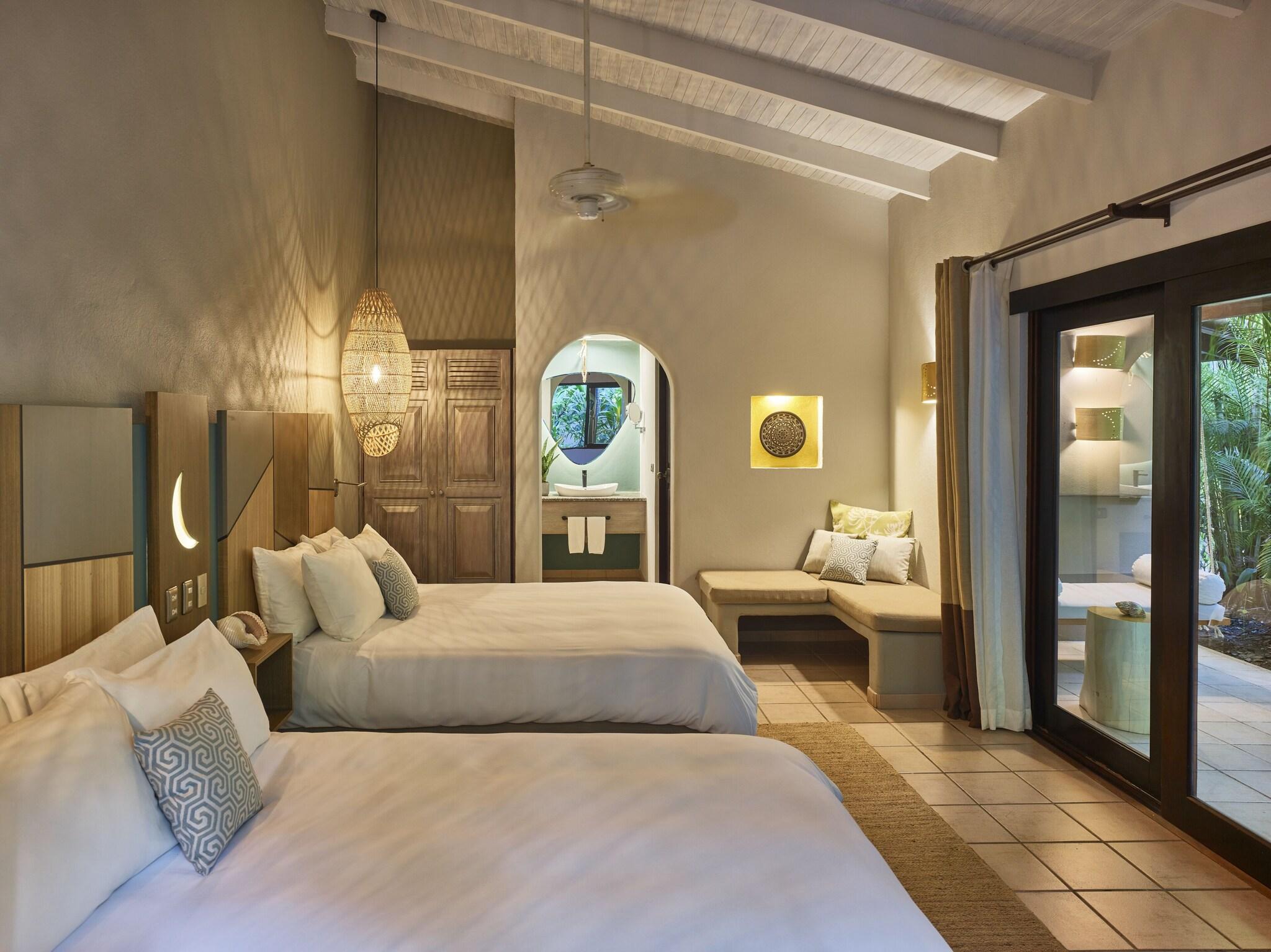 Quadruple Deluxe Two Queen Beds