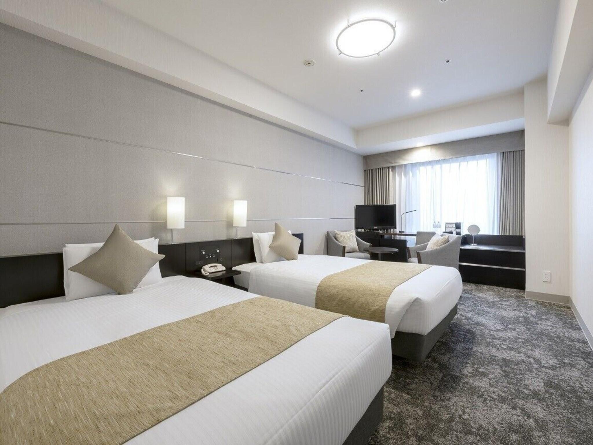 Twin Deluxe Two Beds