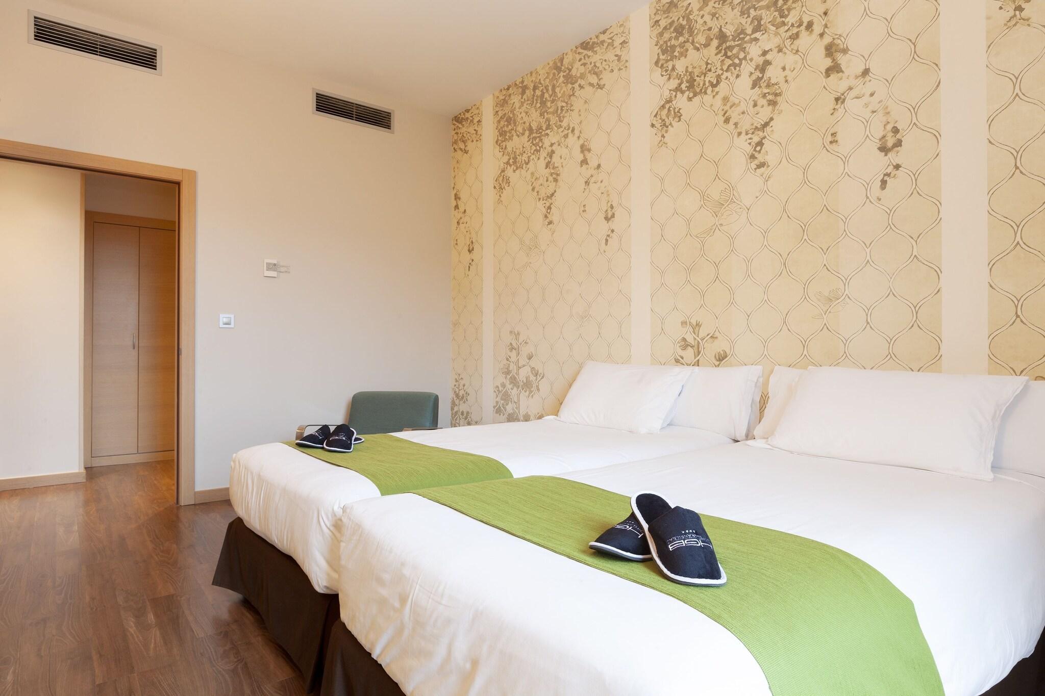 Quadruple with Double Bed