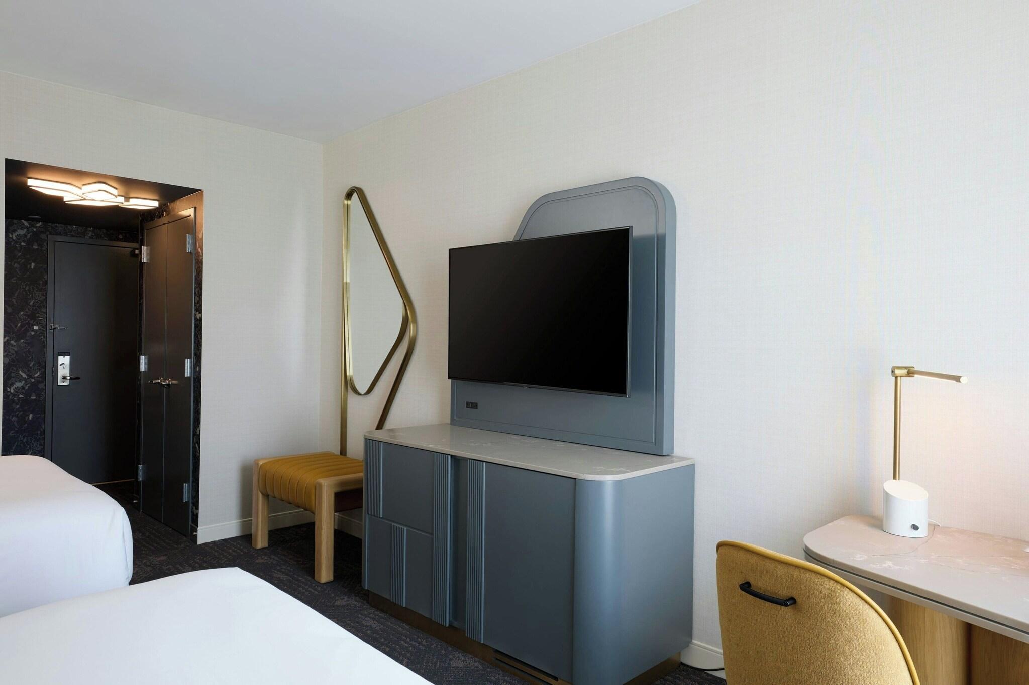 Quadruple Club Two Queen Beds