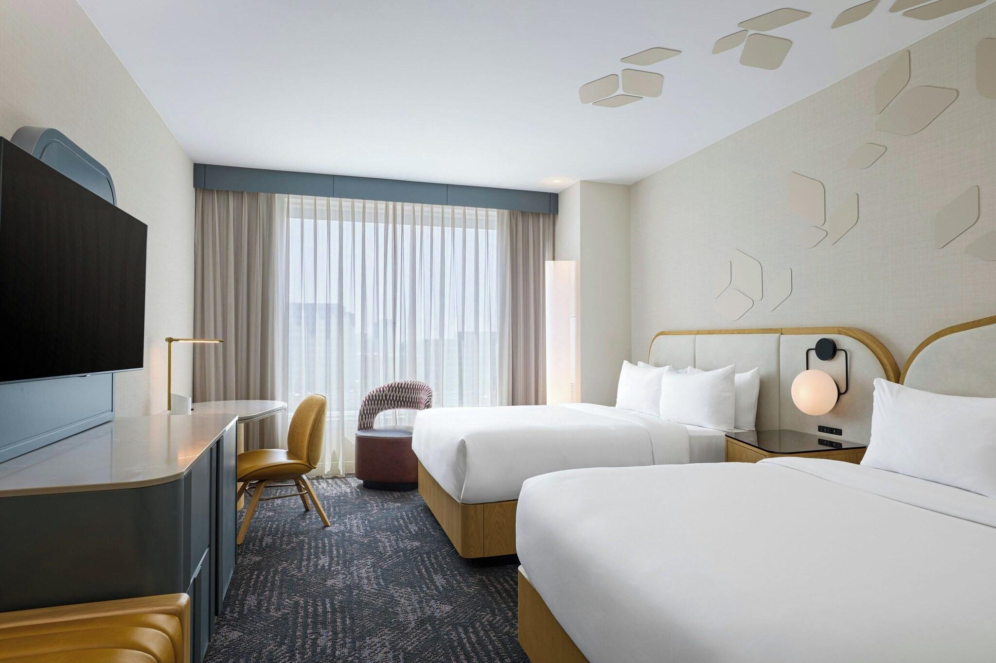 Quadruple Club Two Queen Beds