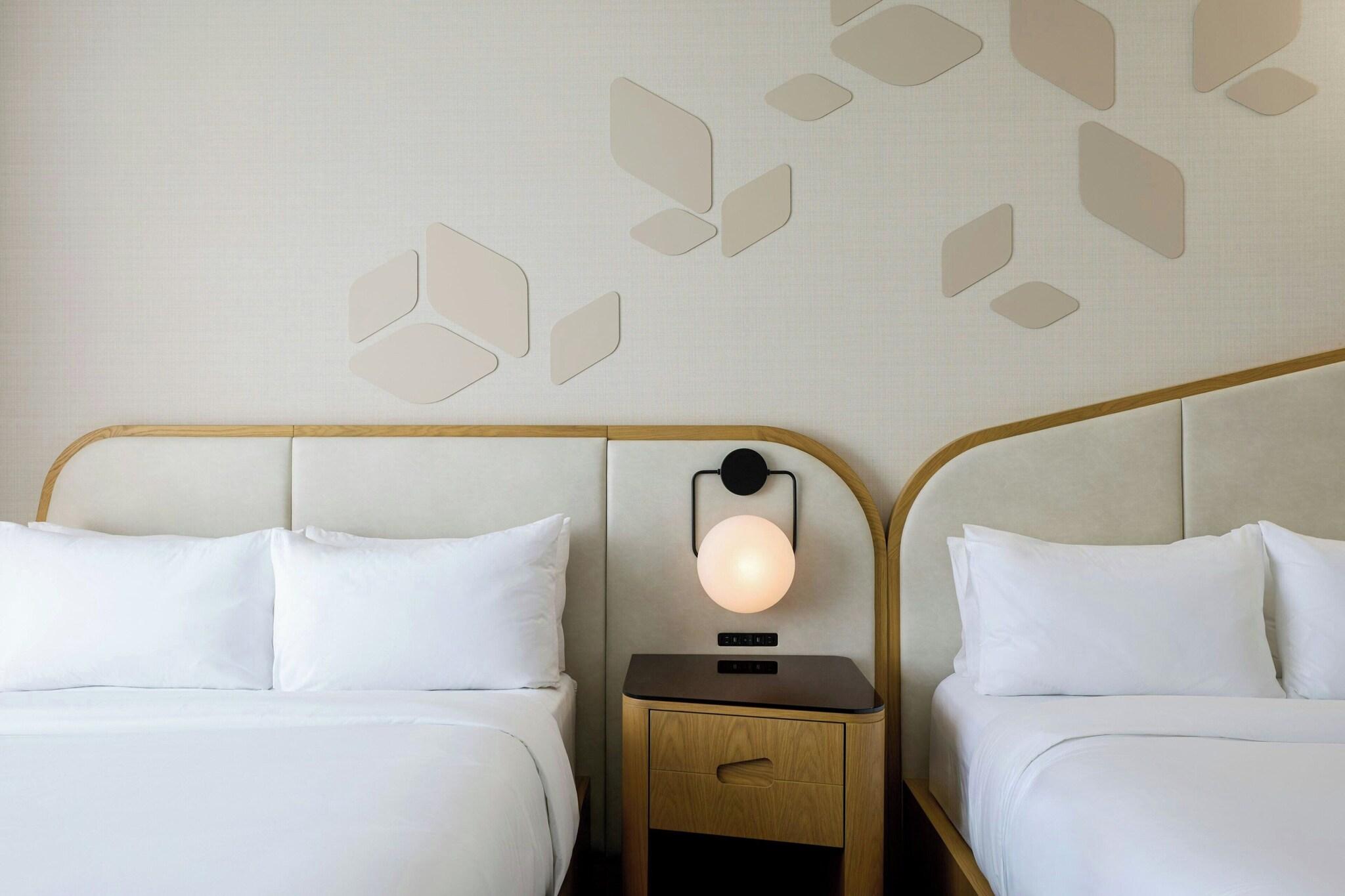 Quadruple Club Two Queen Beds