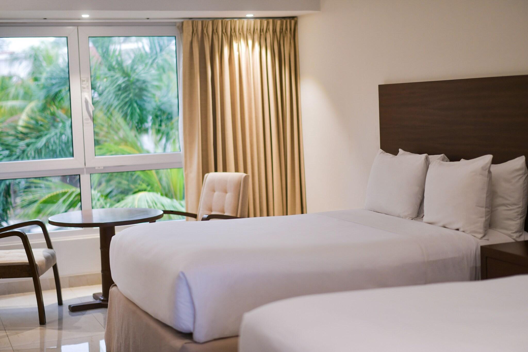 Double Two Queen Beds Pool View