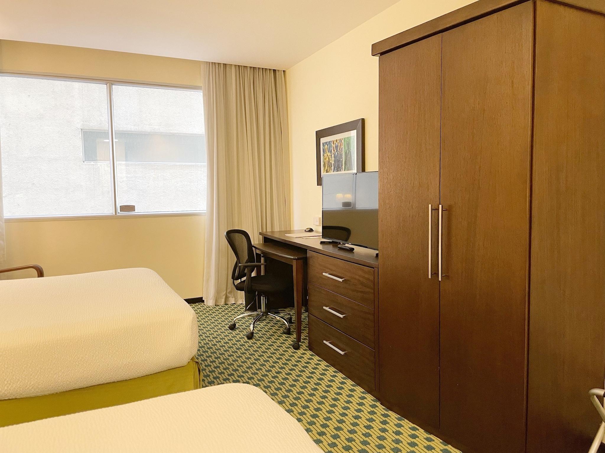 Quadruple City View Two Queen Beds