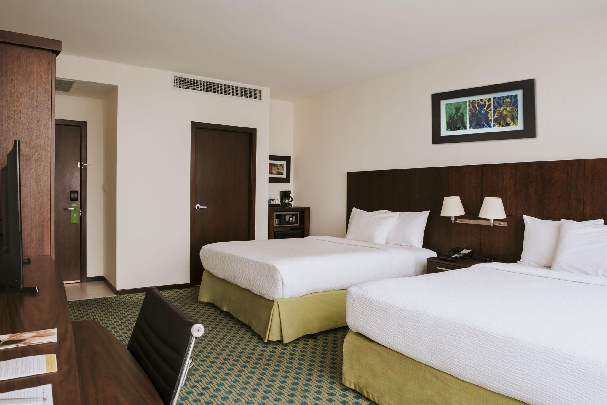 Quadruple City View Two Queen Beds