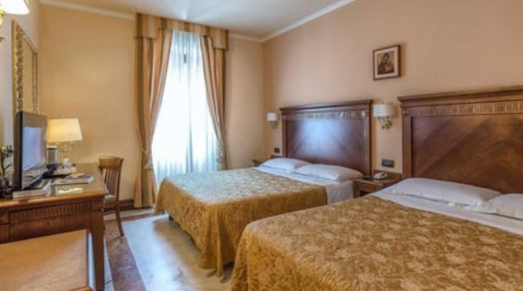 Quadruple Two Queen Beds