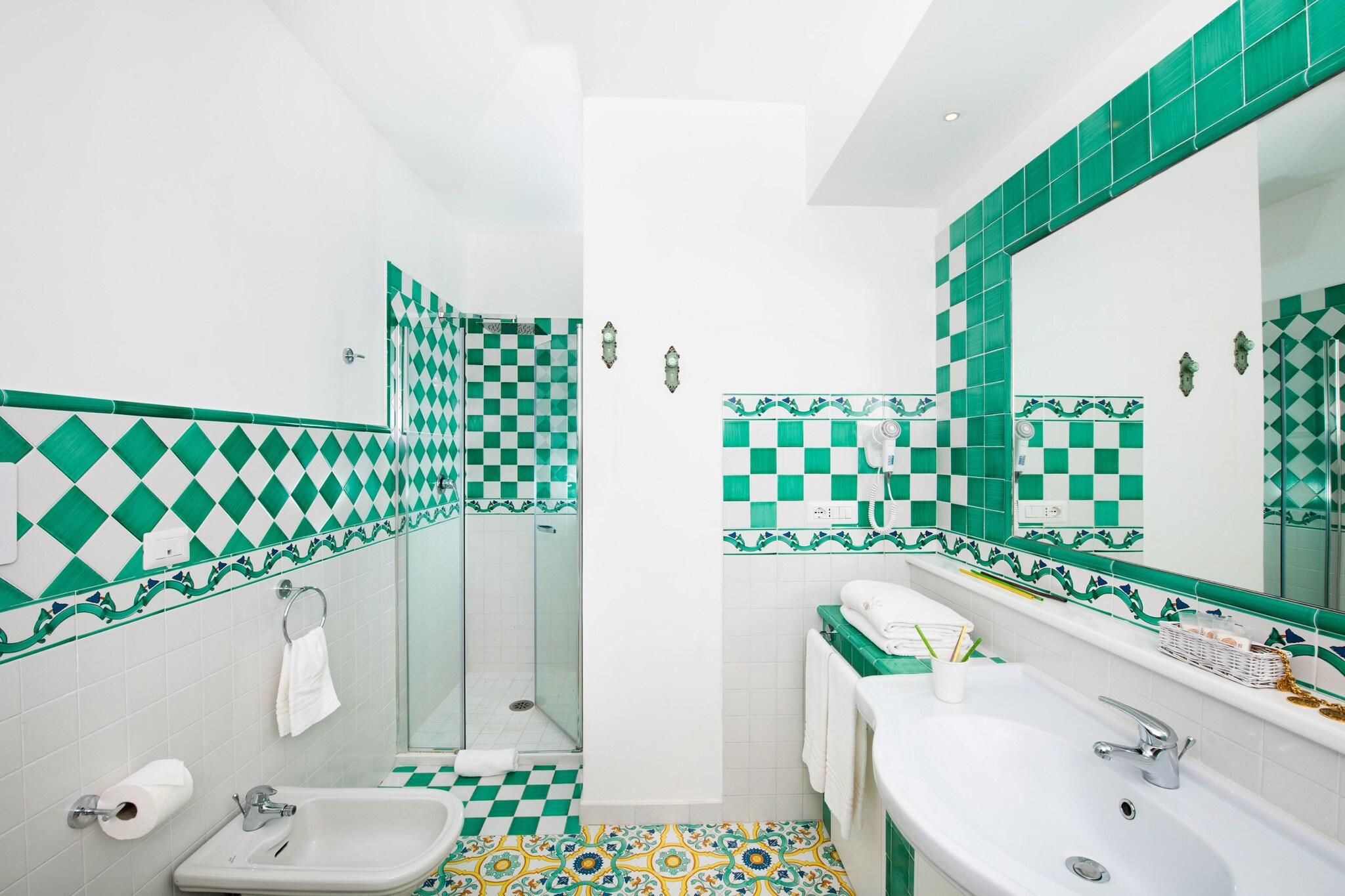 Quadruple Deluxe Sea View with Balcony