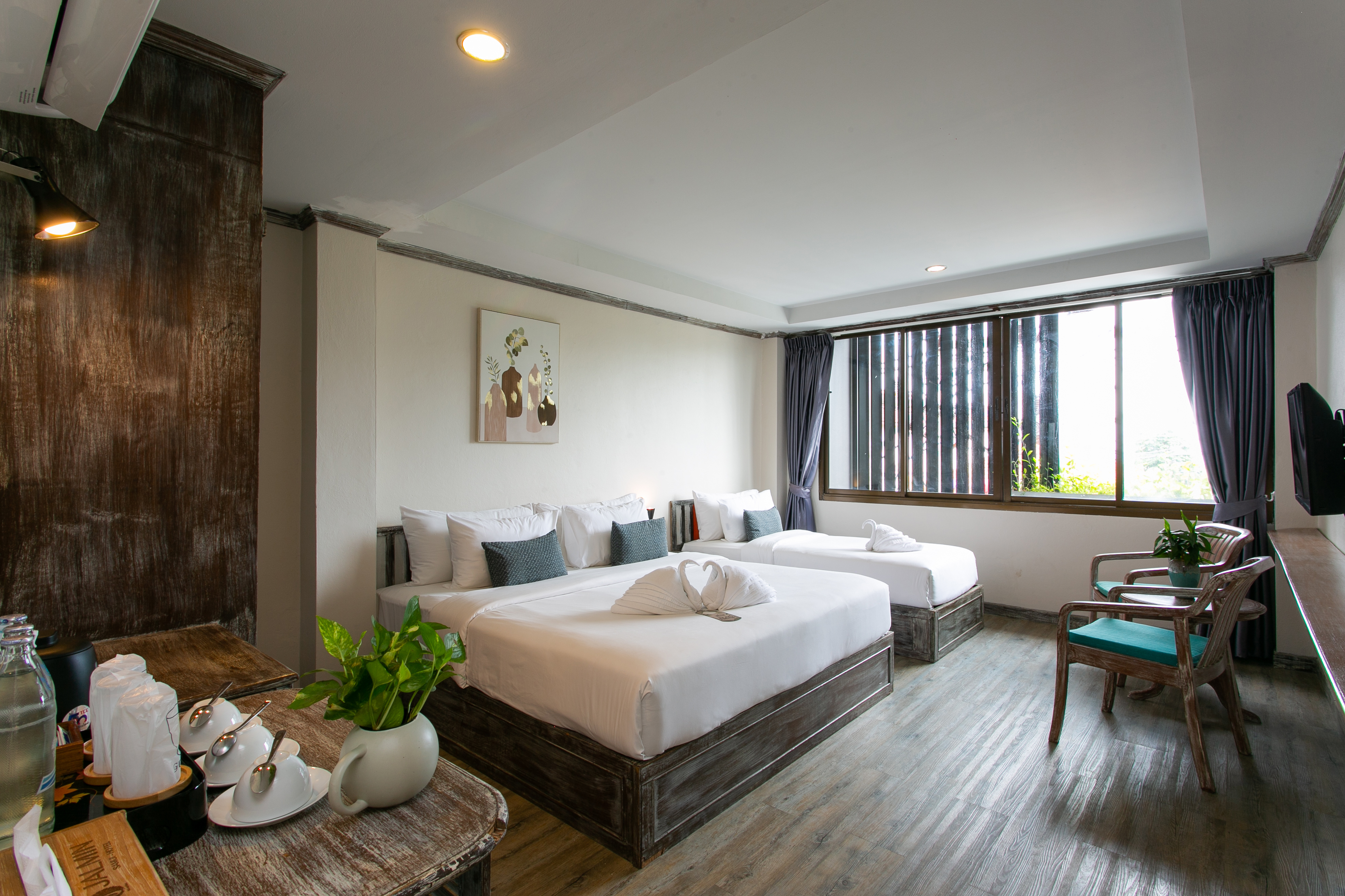 Triple Deluxe Queen Bed