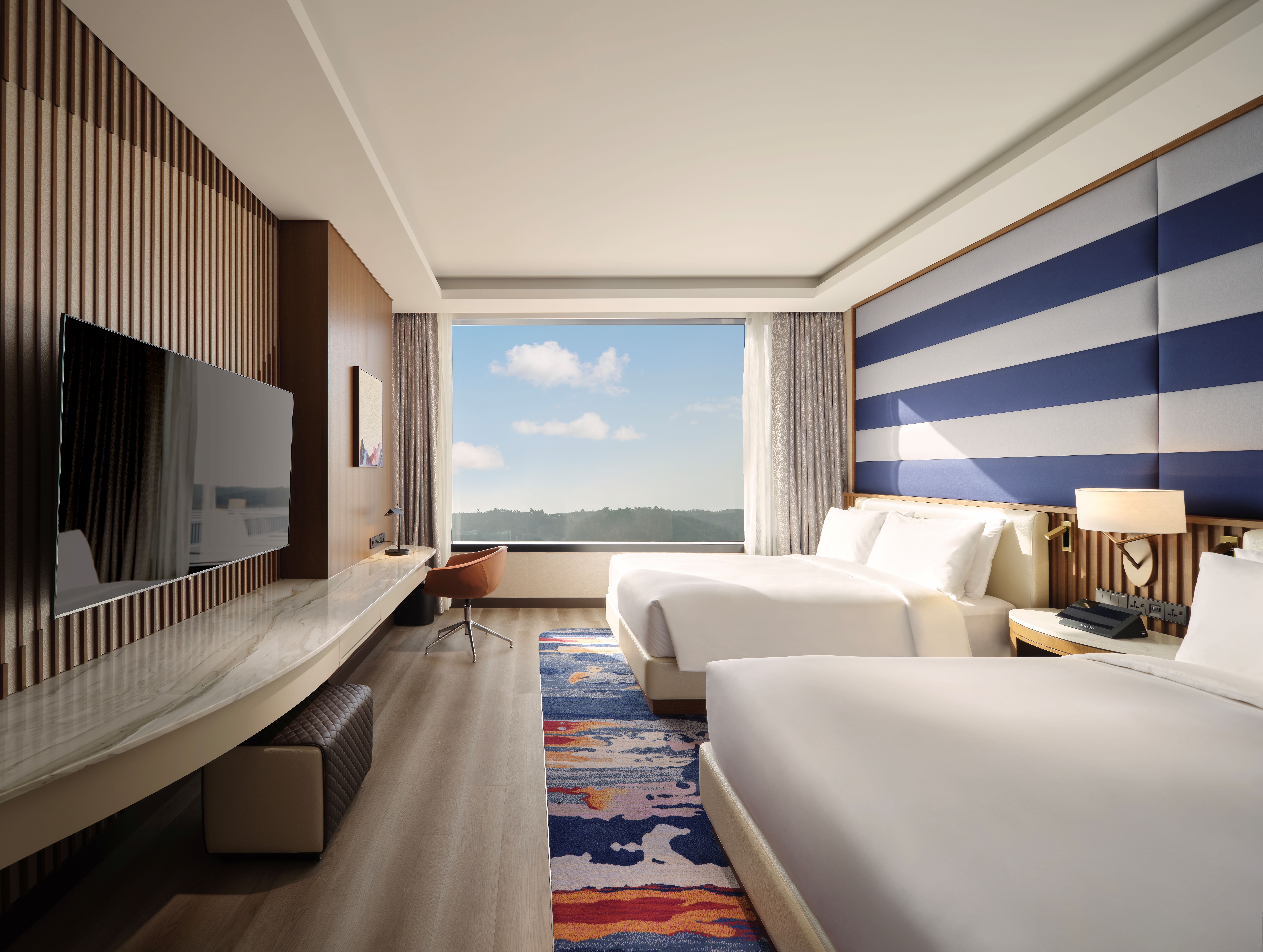 Twin Deluxe Two Queen Beds