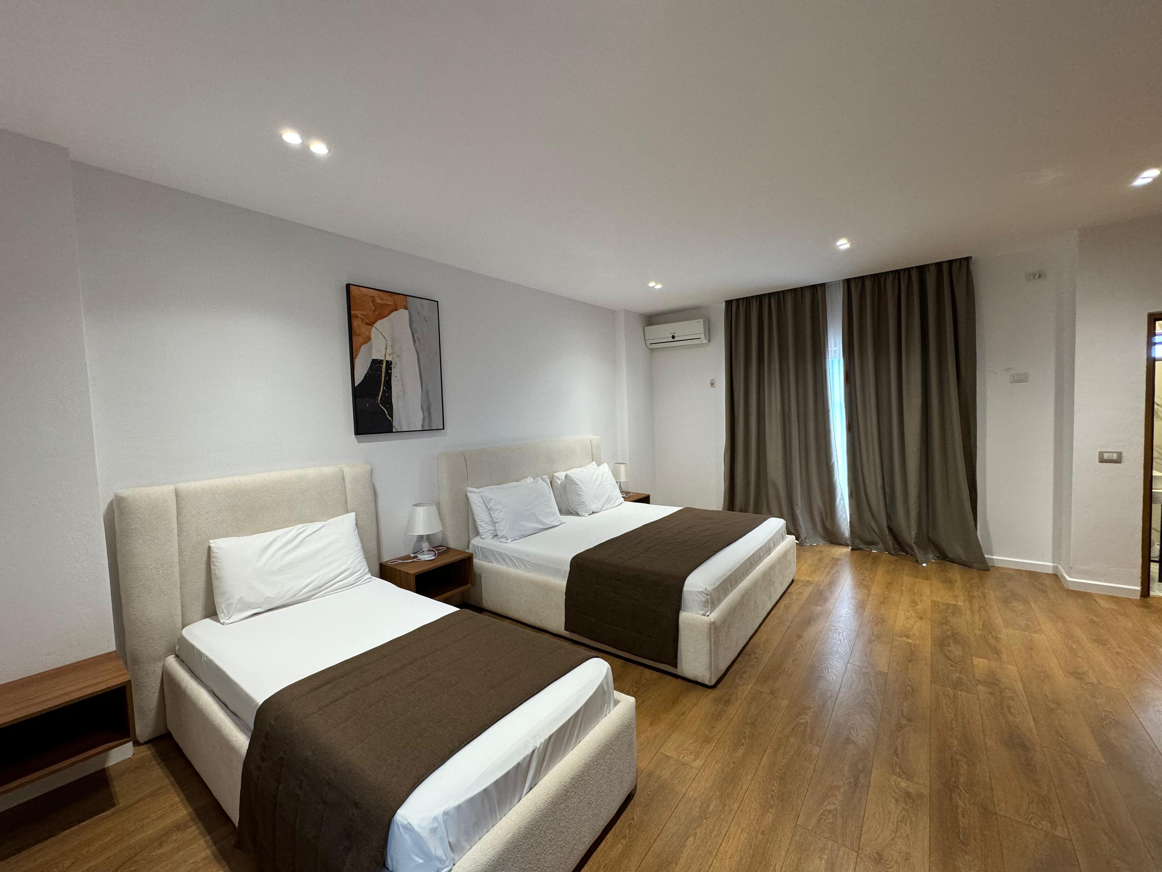 Triple Superior Two Double Beds