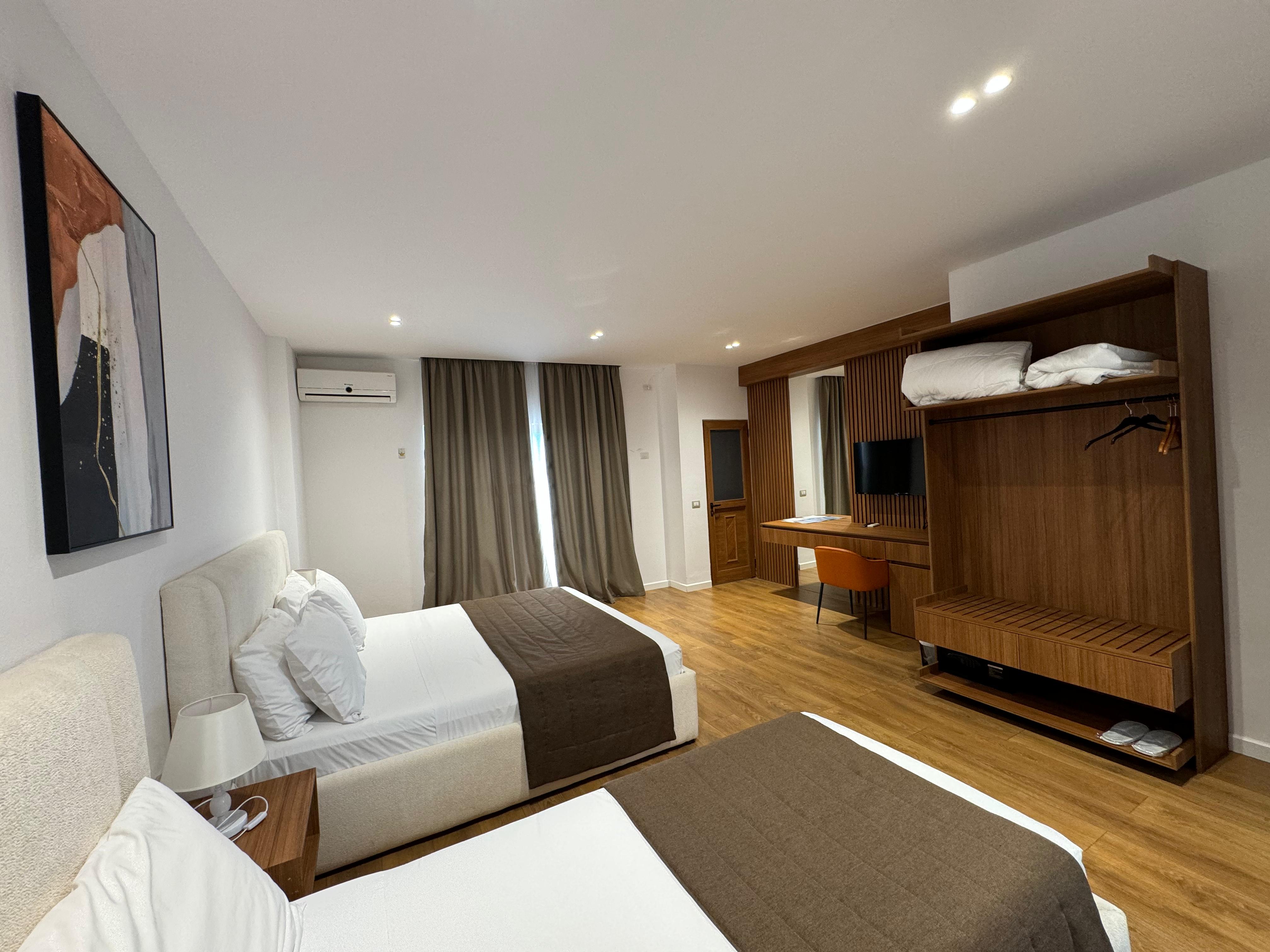 Triple Superior Two Double Beds