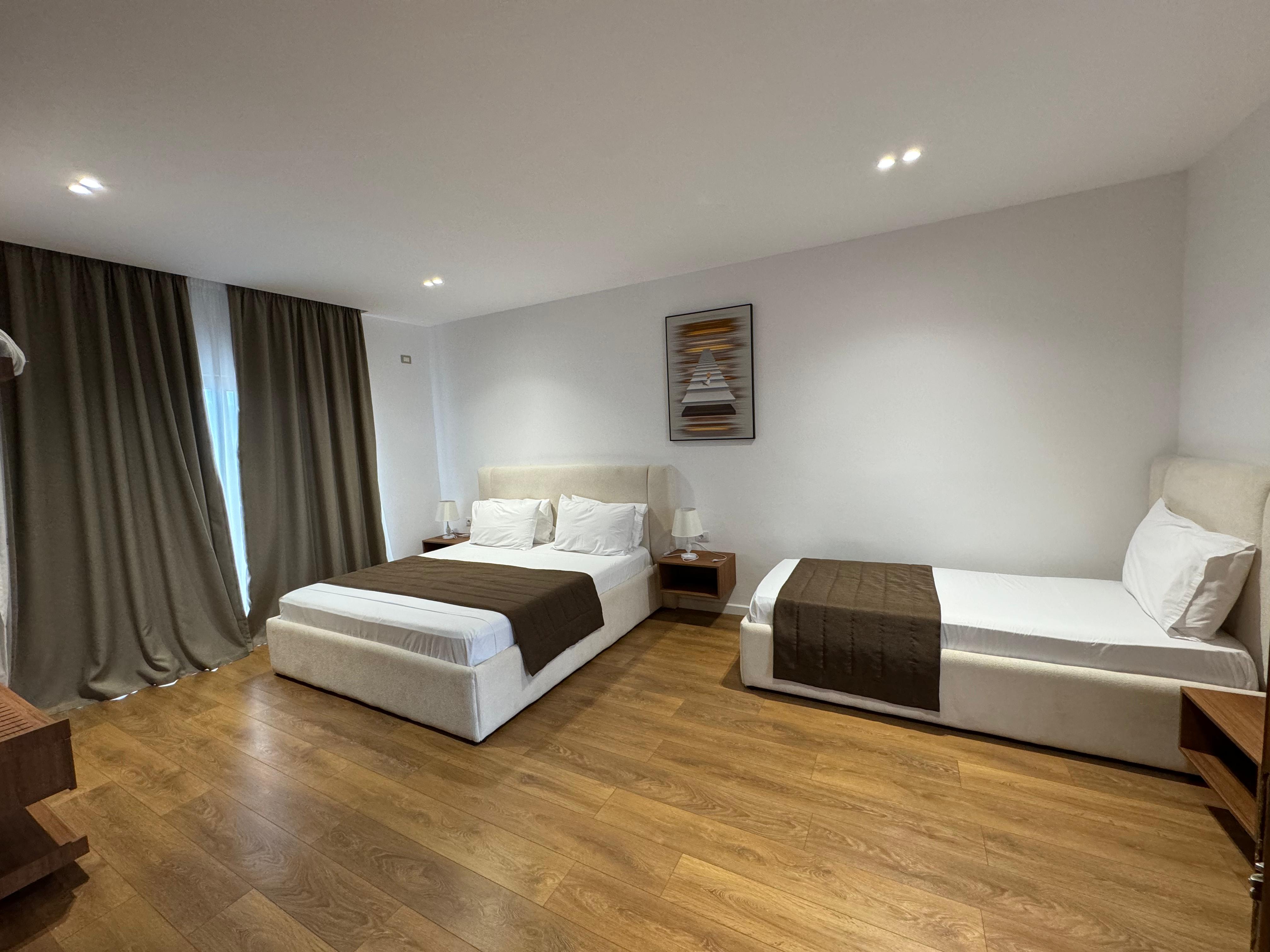 Triple Superior Two Double Beds