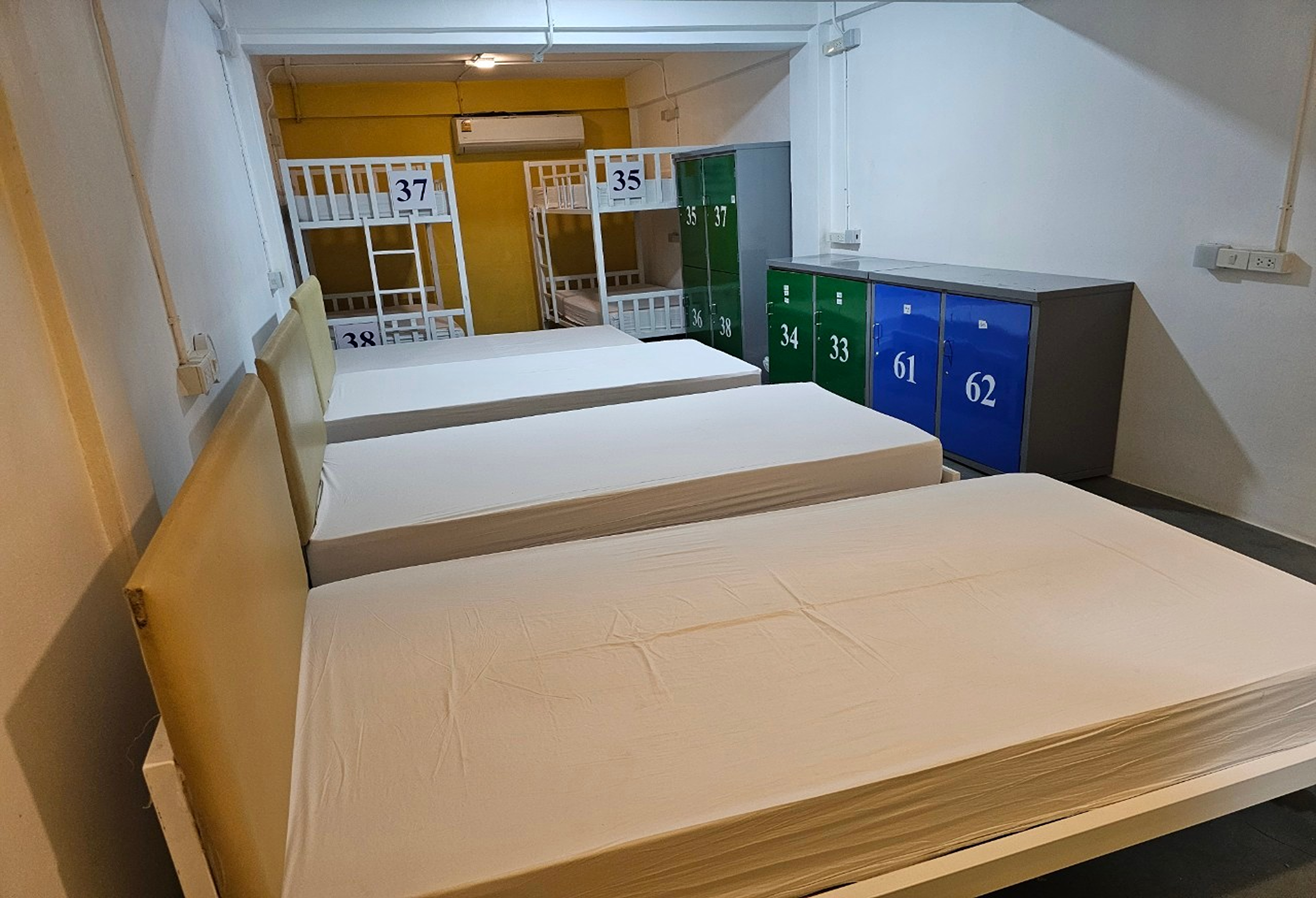 Bed in Dormitory Male Room with Shared Bathroom