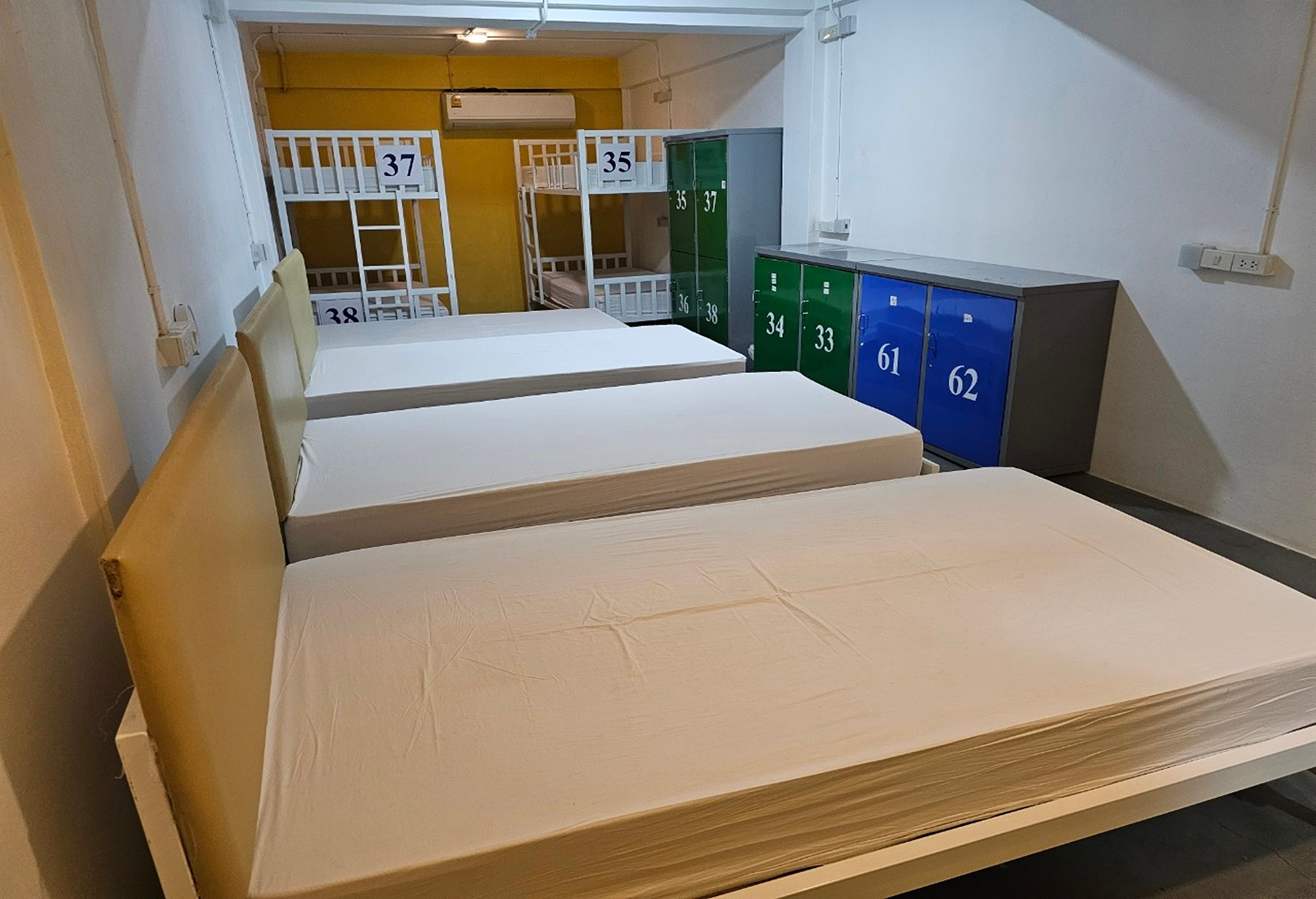 Bed in Dormitory Male Room with Shared Bathroom