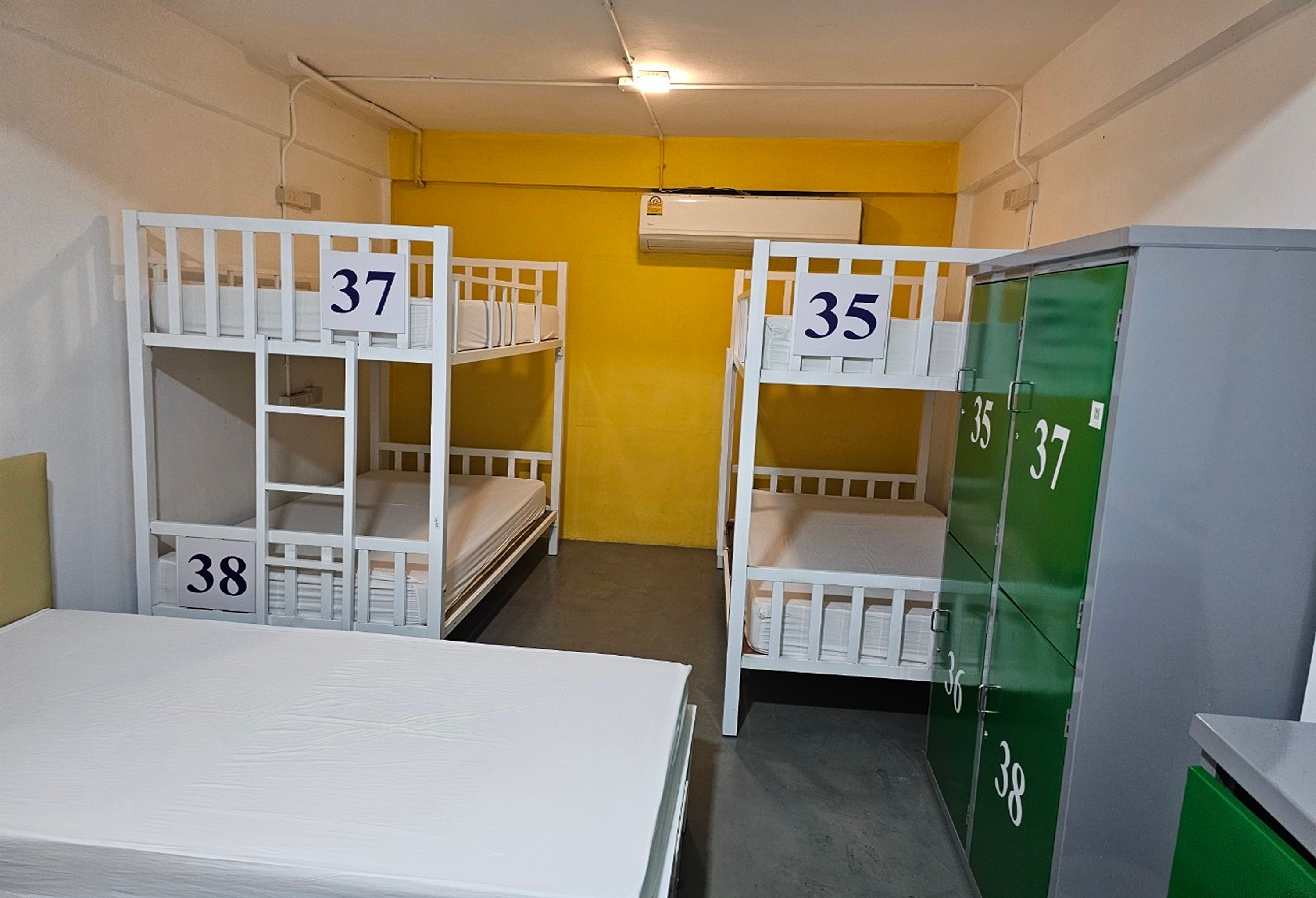 Bed in Dormitory Male Room with Shared Bathroom