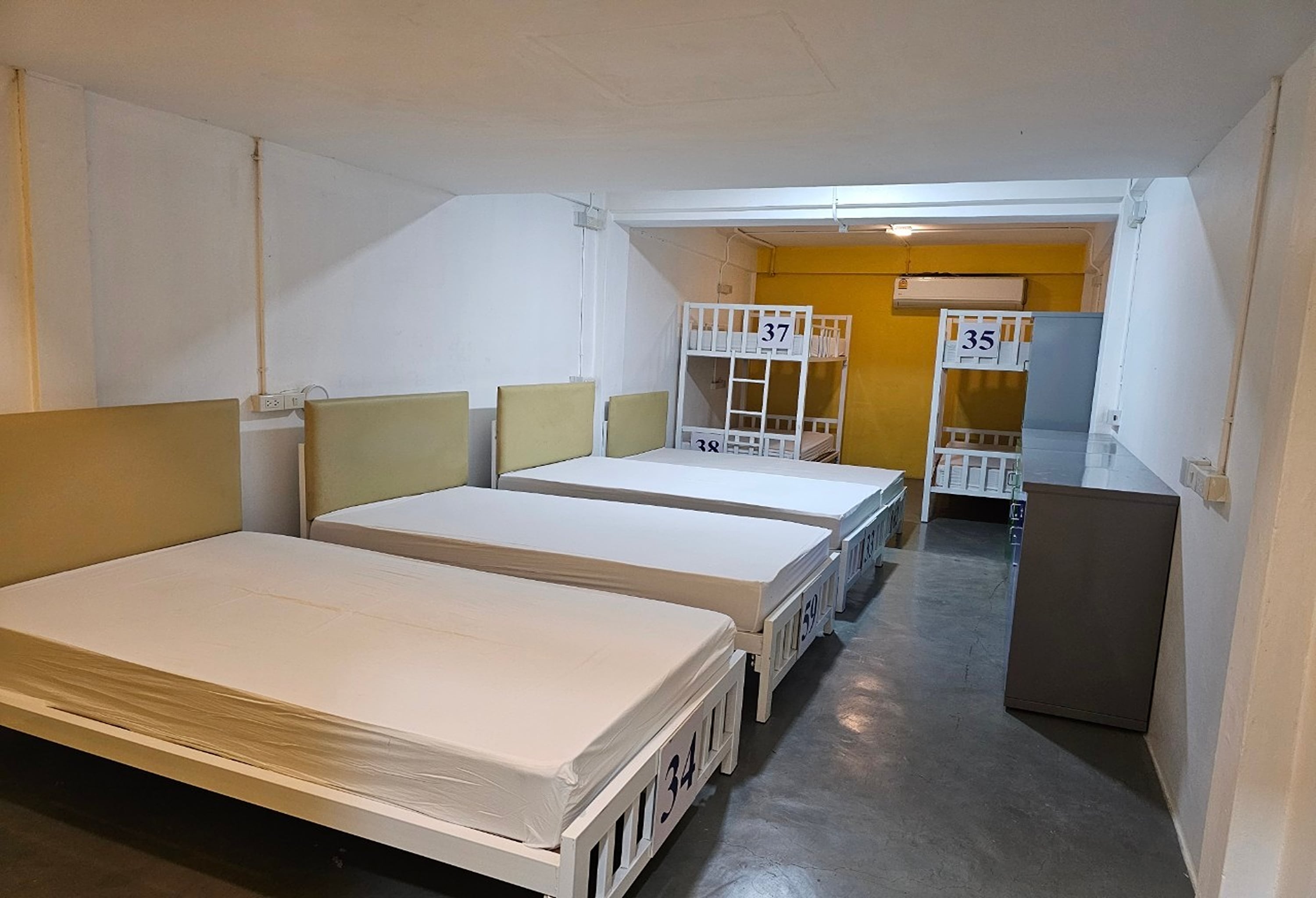 Bed in Dormitory Male Room with Shared Bathroom