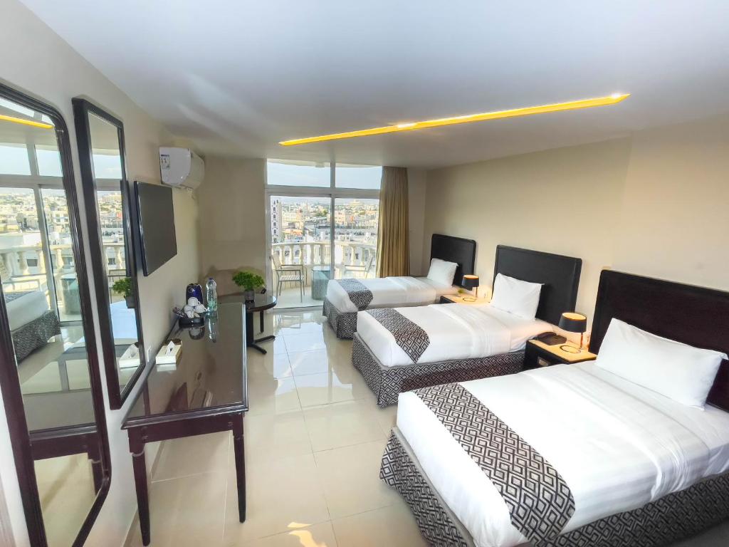 Quadruple Deluxe with Balcony