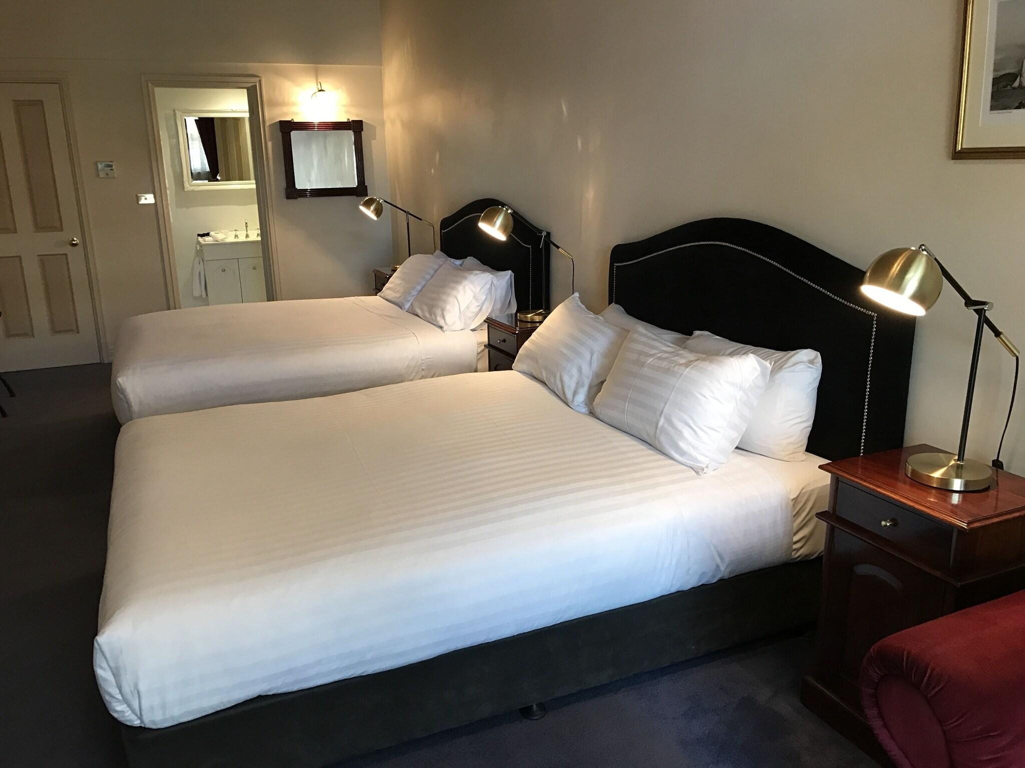 Quadruple Classic Two Queen Beds