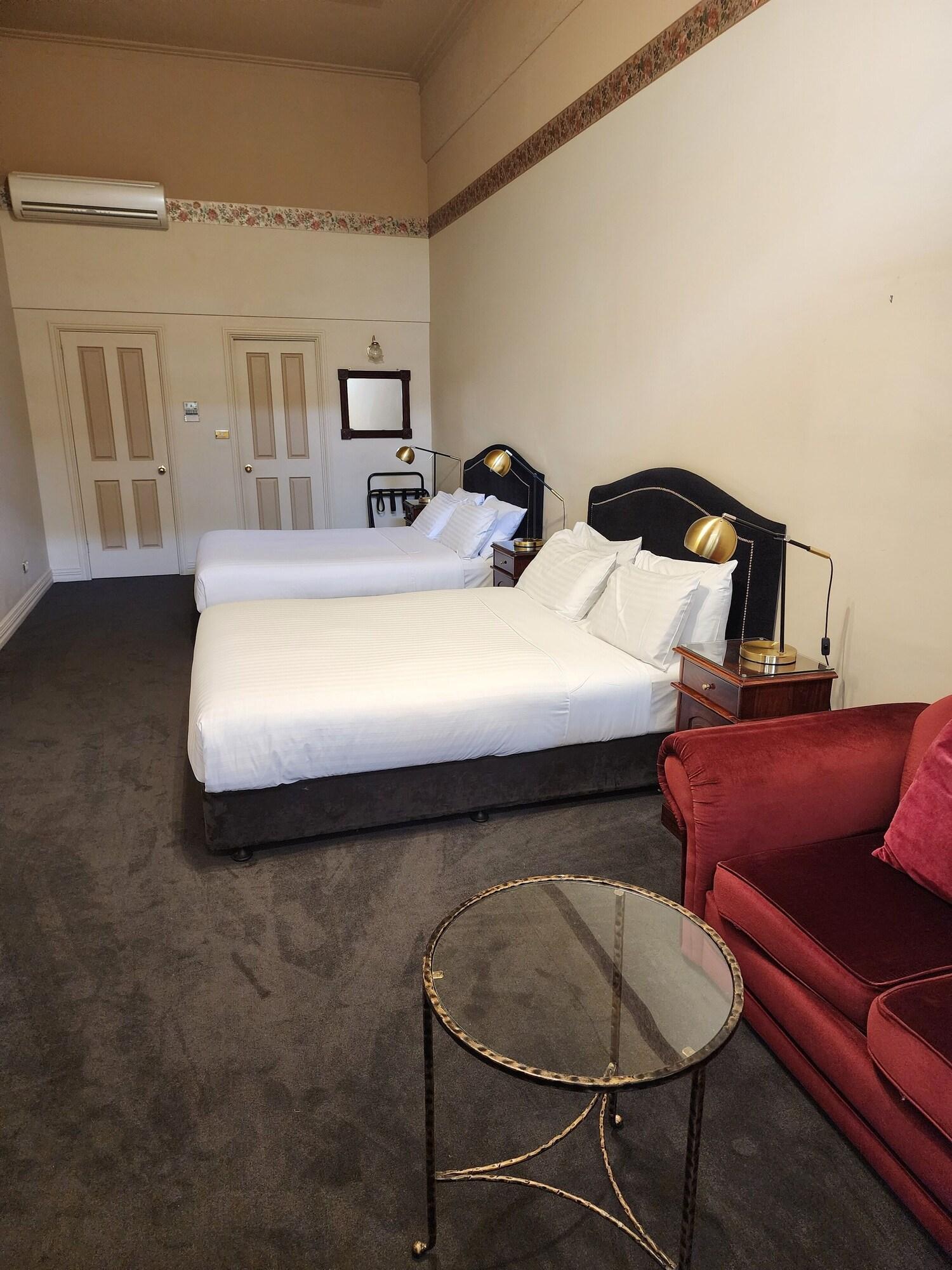 Quadruple Classic Two Queen Beds